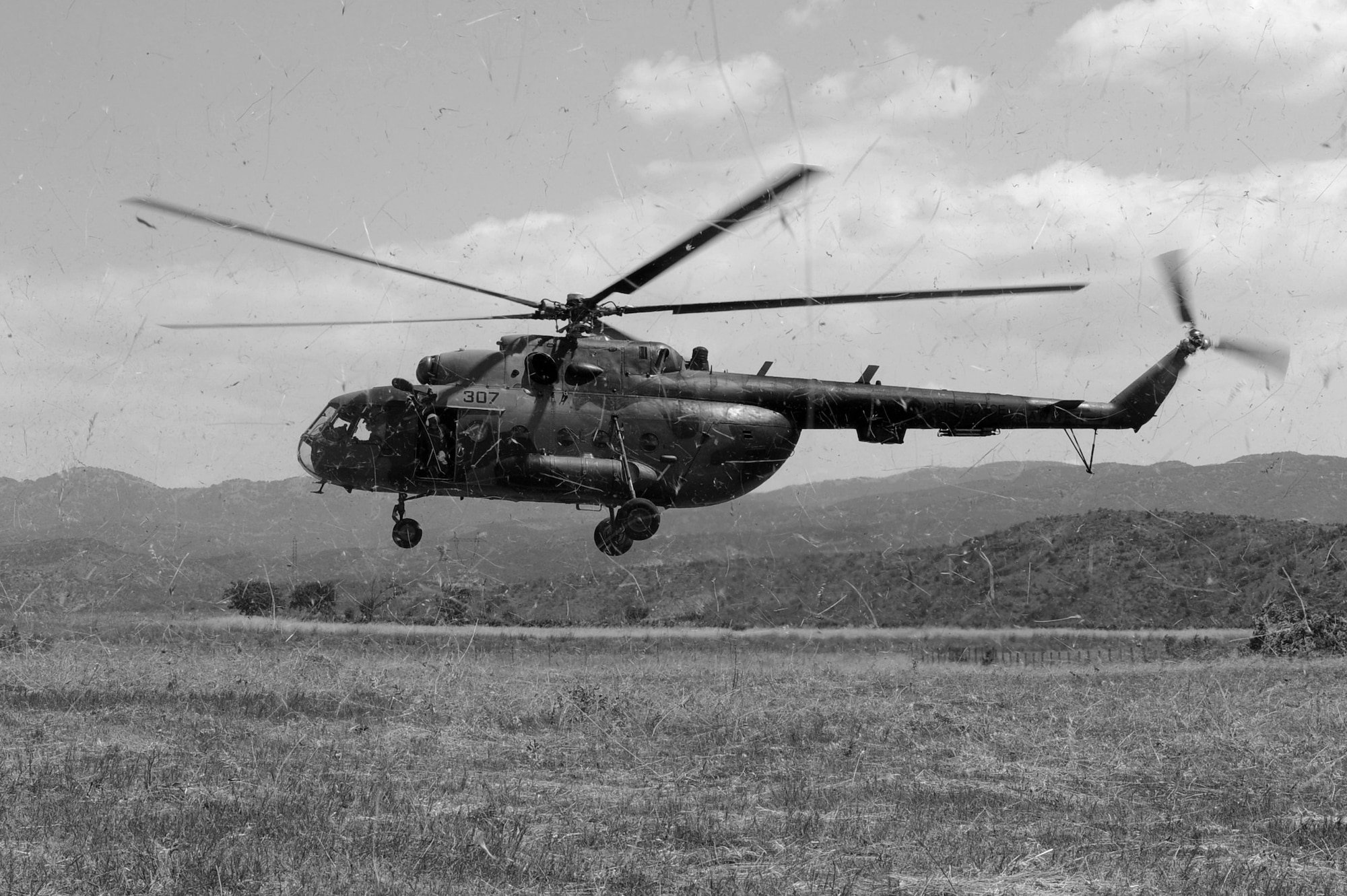 CAMP PEPELISHTE, Macedonia -- A Macedonian MI-17, carrying a simulated trauma patient, lands as part of a medical transport flight during the 2011 Medical Training Exercise in Central and Eastern Europe live exercise June 11. An annual Chairman of the Joint Chiefs of Staff-sponsored regional and multilateral exercise, MEDCEUR is designed to provide medical training and operational experience in a deployed environment for U.S. and partner nations. The countries participating in this year's MEDCEUR are Macedonia, Montenegro, Bosnia and Herzegovina, Serbia, Slovenia and Norway. (U.S. Air Force photo/Staff Sgt. Julius Delos Reyes)