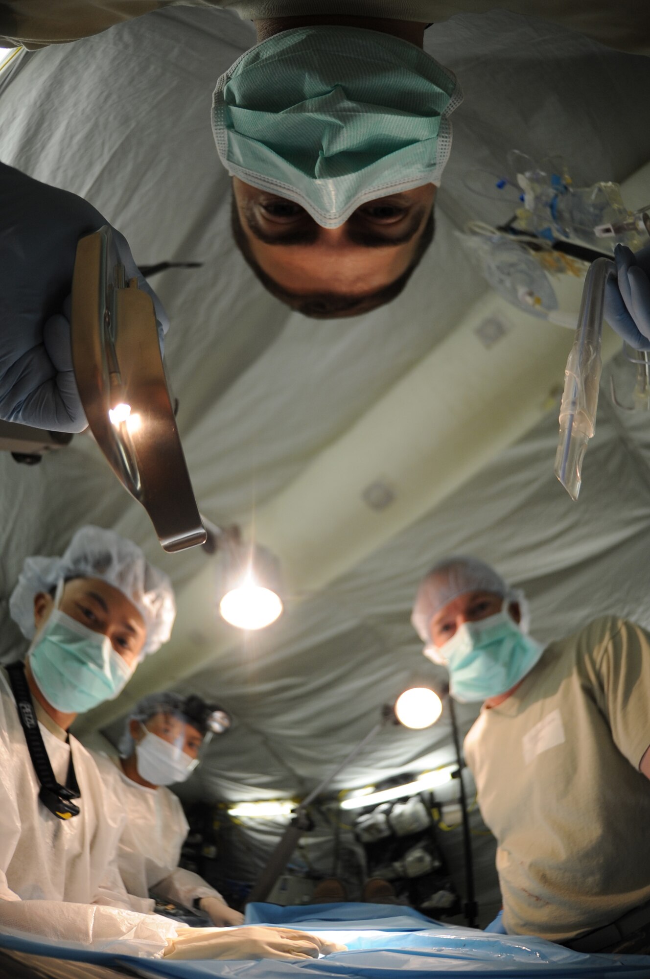 CAMP PEPELISHTE, Macedonia ? Maj. Kevin Webb, 31st Medical Group anesthetist from Aviano Air Base, Italy, prepares to insert a breathing tube into a patient?s mouth in preparation for a simulated surgery during the 2011 Medical Training Exercise in Central and Eastern Europe live exercise June 11. An annual Chairman of the Joint Chiefs of Staff-sponsored regional and multilateral exercise, MEDCEUR is designed to provide medical training and operational experience in a deployed environment for U.S. and partner nations. The countries participating in this year's MEDCEUR are Macedonia, Montenegro, Bosnia and Herzegovina, Serbia, Slovenia and Norway. (U.S. Air Force photo/Staff Sgt. Nadine Y. Barclay)