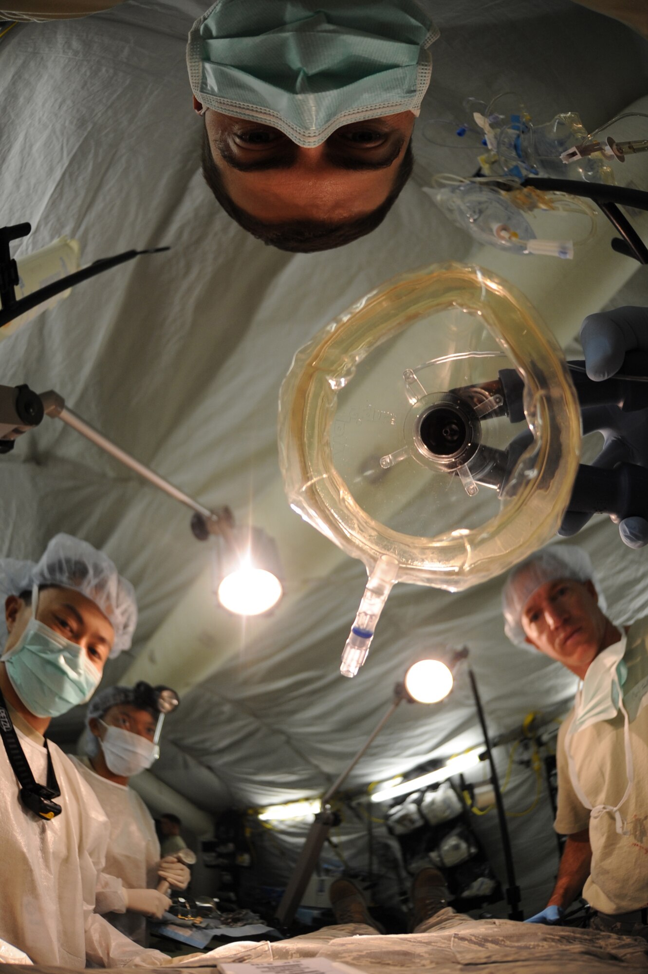 CAMP PEPELISHTE, Macedonia ? Maj. Kevin Webb, 31st Medical Group anesthetist from Aviano Air Base, Italy, administers anesthesia to a patient in preparation for a simulated surgery during the 2011 Medical Training Exercise in Central and Eastern Europe live exercise June 11. An annual Chairman of the Joint Chiefs of Staff-sponsored regional and multilateral exercise, MEDCEUR is designed to provide medical training and operational experience in a deployed environment for U.S. and partner nations. The countries participating in this year's MEDCEUR are Macedonia, Montenegro, Bosnia and Herzegovina, Serbia, Slovenia and Norway. (U.S. Air Force photo/Staff Sgt. Nadine Y. Barclay)