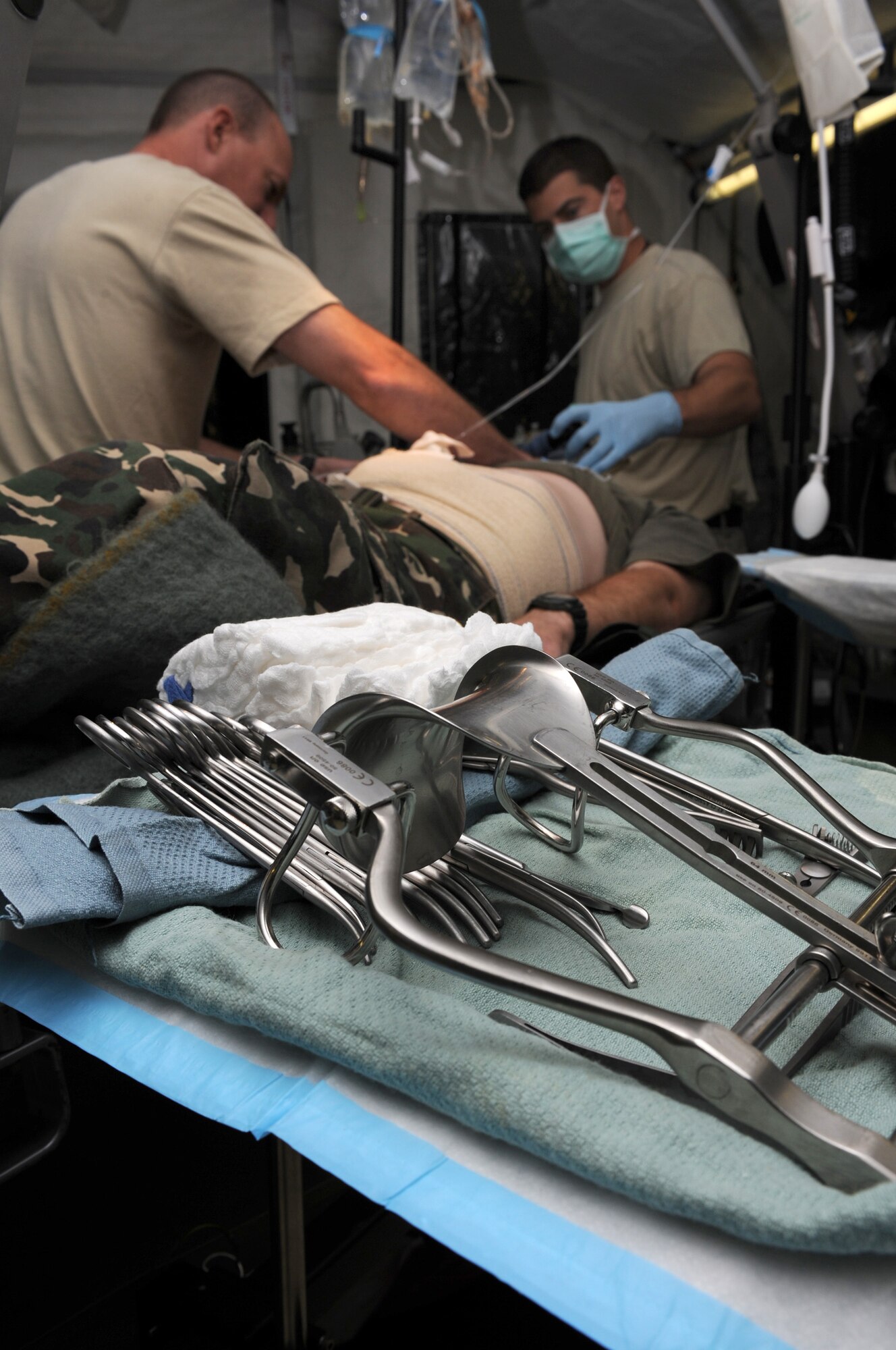 CAMP PEPELISHTE, Macedonia ? Surgical medical tools sit out while U.S. medical personnel prepare for simulated surgery on a patient during the 2011 Medical Training Exercise in Central and Eastern Europe live exercise June 11. An annual Chairman of the Joint Chiefs of Staff-sponsored regional and multilateral exercise, MEDCEUR is designed to provide medical training and operational experience in a deployed environment for U.S. and partner nations. The countries participating in this year's MEDCEUR are Macedonia, Montenegro, Bosnia and Herzegovina, Serbia, Slovenia and Norway. (U.S. Air Force photo/Staff Sgt. Nadine Y. Barclay)
