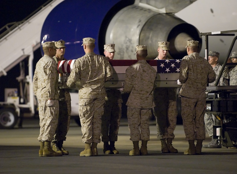 A U.S. Marine Corps carry team transfers the remains of Marine Lance Cpl. Nicholas S. O'Brien, of Stanley, N.C., at Dover Air Force Base, Del., June 12, 2011. O'Brien was assigned to the 1st Battalion, 5th Marine Regiment, 1st Marine Division, I Marine Expeditionary Force, Camp Pendleton, Calif. (U.S. Air Force photo/Steve Kotecki)