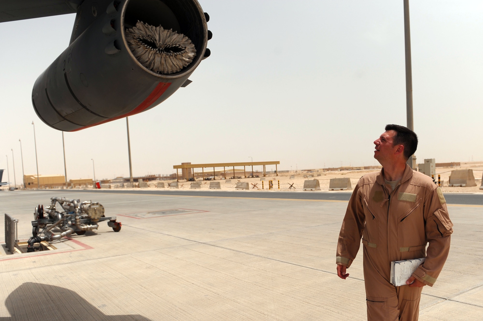 Capt. Thomas Dolan, 340th Expeditionary Air Refueling Squadron pilot, inspects the multi-point refueling system on a KC-135 Stratotanker prior to take off from an undisclosed location bound for an air refueling mission over Afghanistan in support of Operation Enduring Freedom. (U.S. Air Force photo/Master Sgt. William Greer)