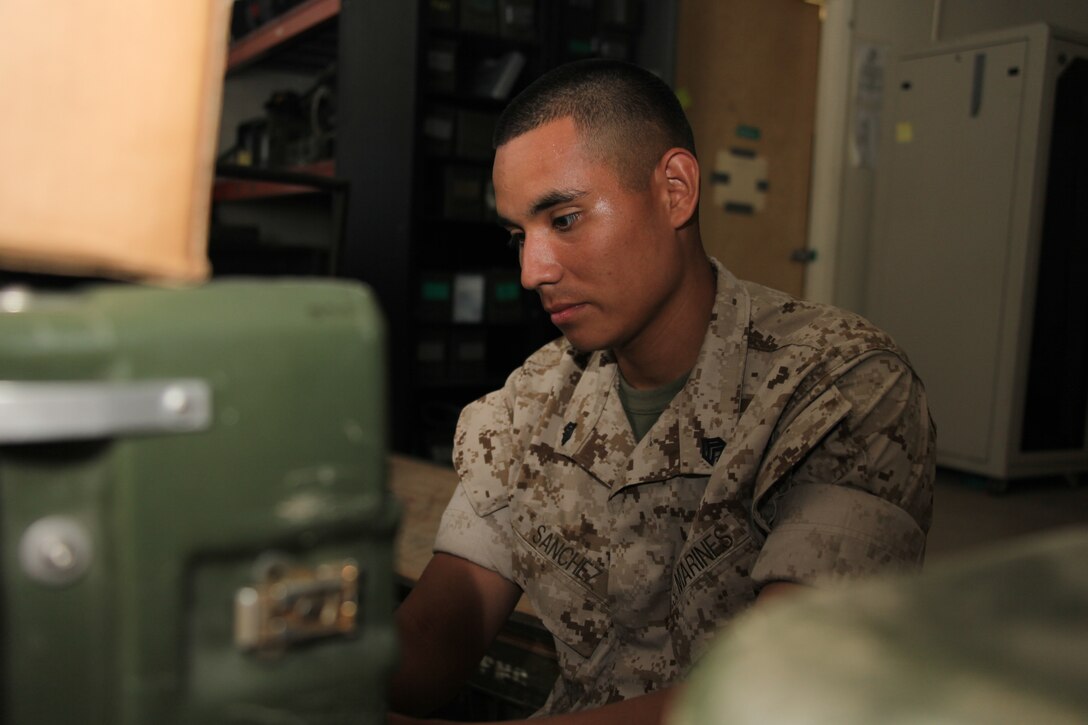 Sgt. Jose P. Sanchez, a communications operator with Marine Wing Communication Squadron 28, hooks up a computer system needed for a field exercise June 13. Sanchez was recognized as the Marine Corps’ Enlisted Armed Forces Communications and Electronics Leadership Award winner for his actions and dedication to duty while deployed in Afghanistan. “Sanchez is a very focused and motivated individual,” said Tech Sgt. Shaun T. Stephenson, Sanchez’s staff noncommissioned officer in charge while deployed to Afghanistan. “He is ready to go with anything that needs to be done and gets the job done extremely well.”