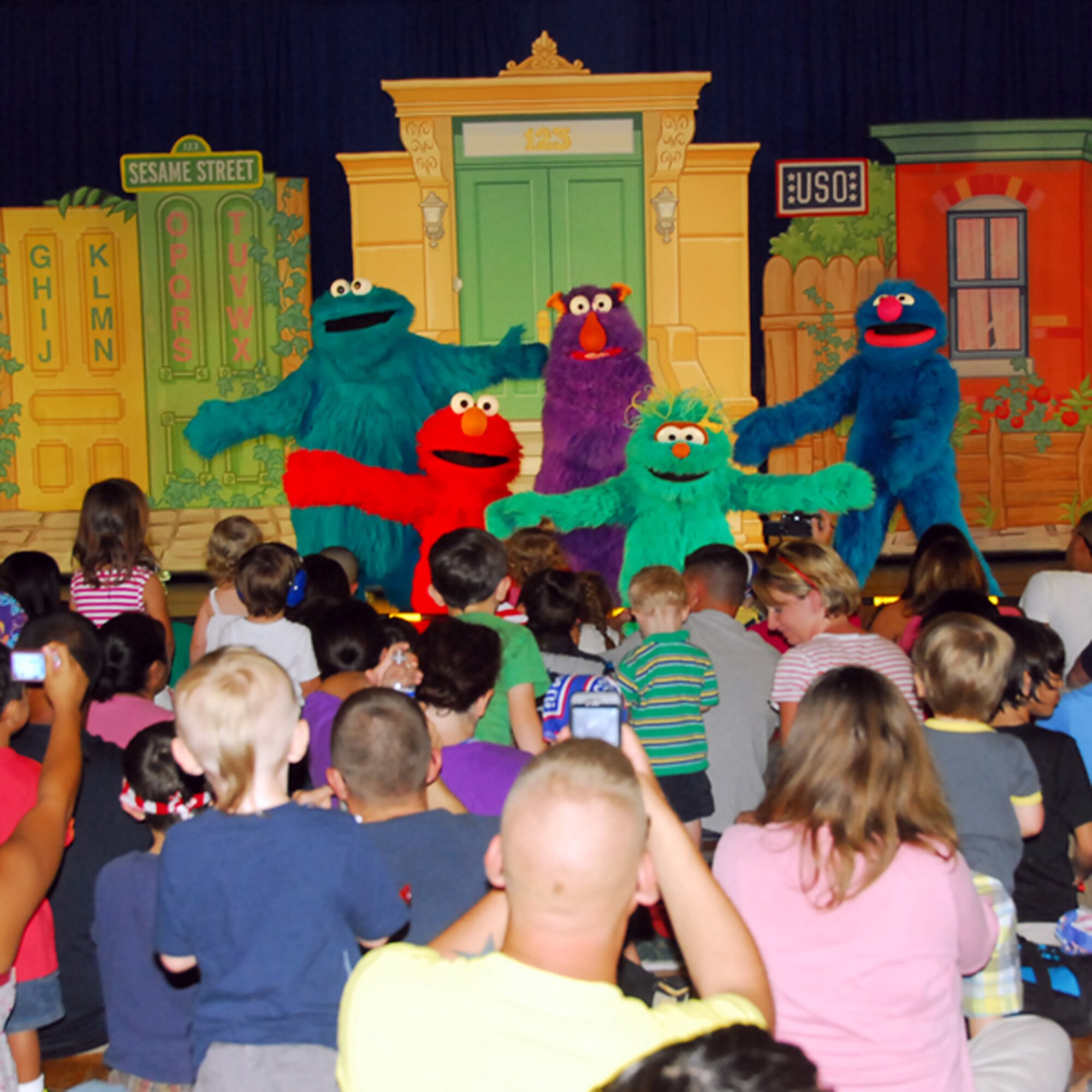 Characters from the Sesame Street television show paid a visit to Andersen AFB and performed for military members and their families June 9 at the Youth Center gym. The United Service Organizations teamed with Sesame Workshop, the non-profit organization that produces Sesame Street, to bring The Sesame Street/USO Experience for Military Families to the Asia-Pacific region. (U.S. Air Force photo/Airman 1st Class Whitney Tucker) 

 
