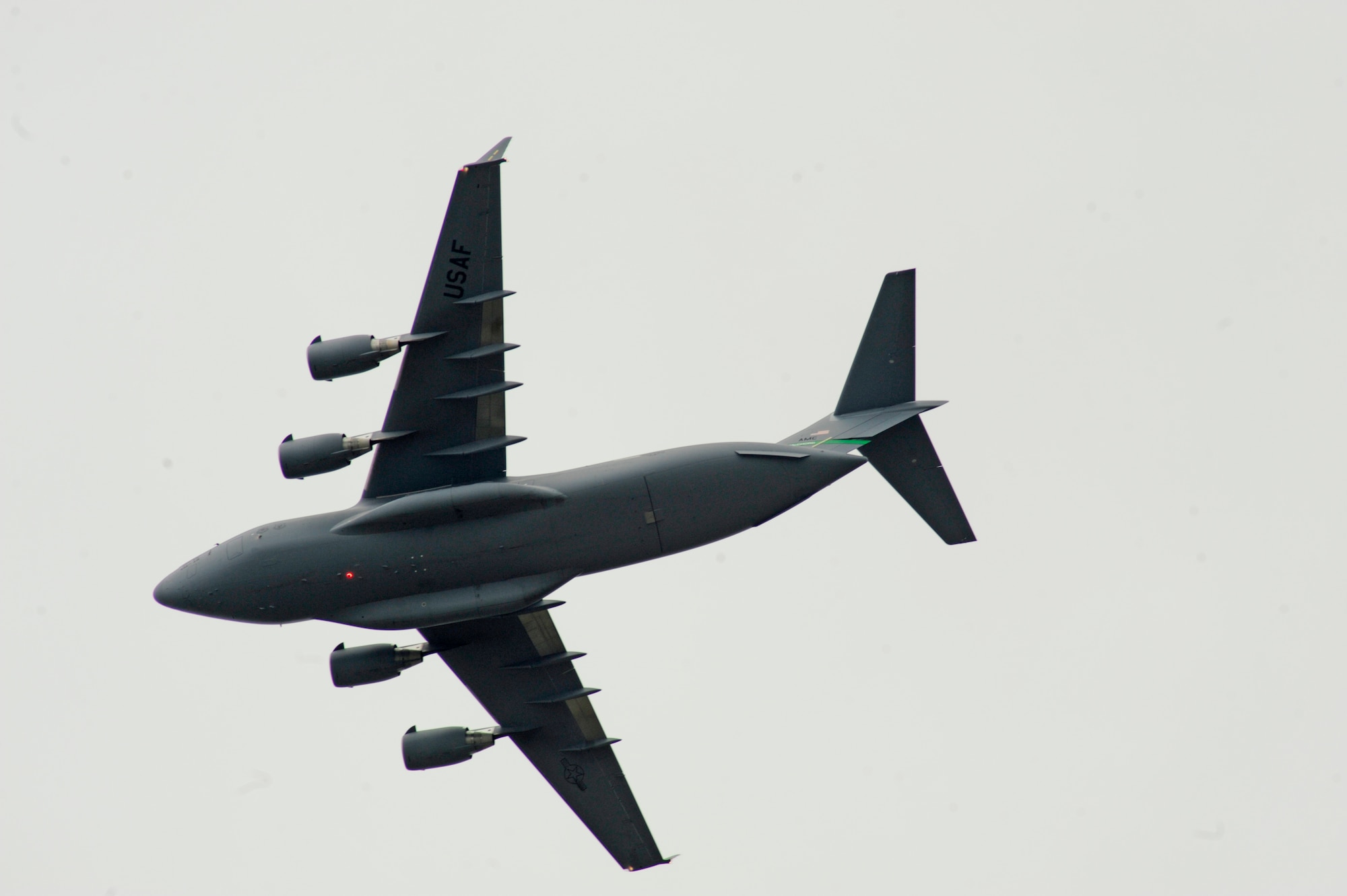 A C-17 Globemaster III takes a turn during the final flight of Col. Kevin Kilb, 62nd Airlift Wing commander, at Joint Base Lewis-McChord June 8. Colonel Kilb has flown more than 4,000 flight hours in the C-17, KC-10 Extender, C-130 E/H Combat Talon, C-21, UH-1N Iroquois, T-6A Texan II, T-38 Talon and T-37 Tweet. (U.S. Air Force photo/Adamarie Lewis-Page)
