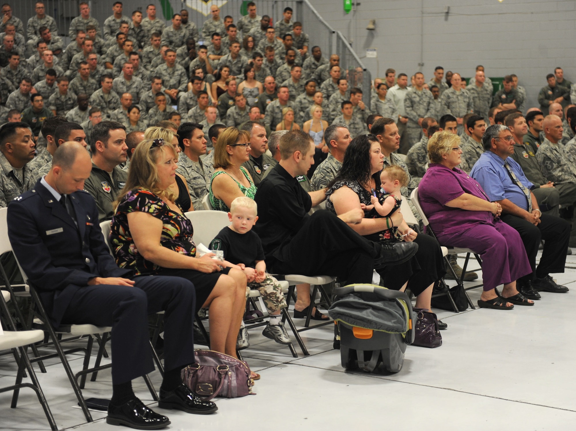 Family, friends, coworkers and members of the Nellis Air Force Base, Nev., rescue community gathered to honor and remember the crew of Pedro 66 during a memorial service June 9, 2011. The crew's HH-60G Pave Hawk helicopter crashed in southwest Afghanistan June 9, 2010, during a rescue mission supporting Operation Enduring Freedom, killing five of the crew and critically injuring two. (U.S. Air Force photo/Staff Sgt. Taylor Worley)