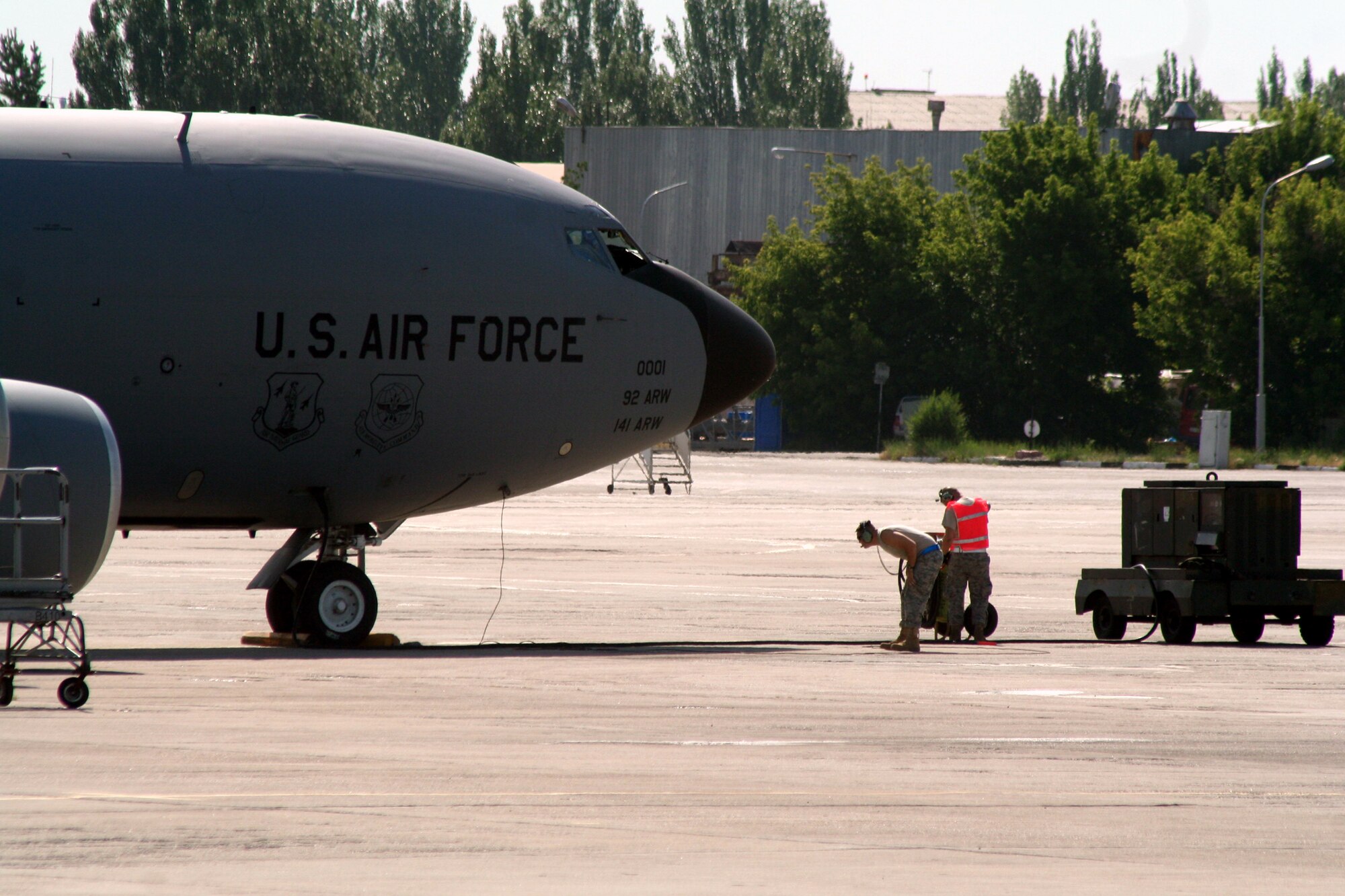 Aircraft maintenance Airmen assigned to the 376th Air Expeditionary Wing prepares KC-135R Stratotanker for a combat air refueling mission from the Transit Center at Manas, Kyrgyzstan, on June 7, 2011. The 376th AEW supports Operation Enduring Freedom and other operations in the U.S. Central Command area of responsibility. (U.S. Air Force Photo/Master Sgt. Scott T. Sturkol)