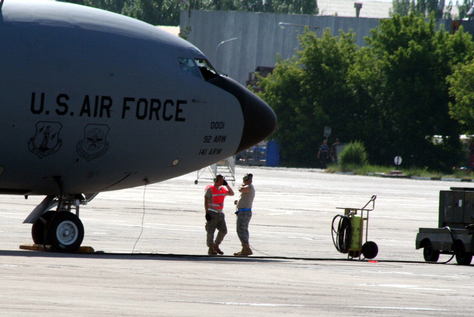 Aircraft maintenance Airmen assigned to the 376th Air Expeditionary Wing prepares KC-135R Stratotanker for a combat air refueling mission from the Transit Center at Manas, Kyrgyzstan, on June 7, 2011. The 376th AEW supports Operation Enduring Freedom and other operations in the U.S. Central Command area of responsibility. (U.S. Air Force Photo/Master Sgt. Scott T. Sturkol)