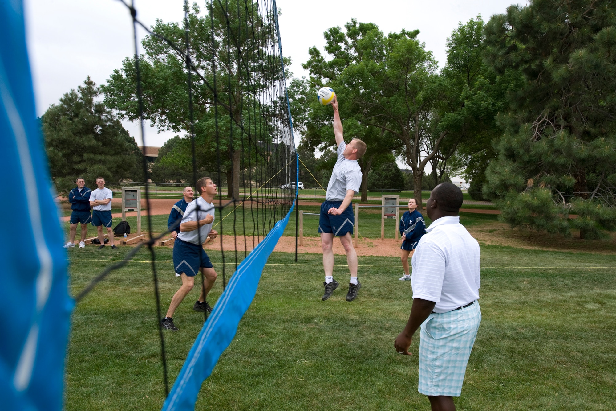 Volleyball was just one of 26 events held June 9, 2011, during Peterson Air Force Base’s Sports and Field Day. The annual event had squadrons and personnel going head-to-head in tug-of-war, swimming, poker, bowling and more organized by the 21st Force Support Squadron. (U.S. Air Force photo/Craig Denton) 