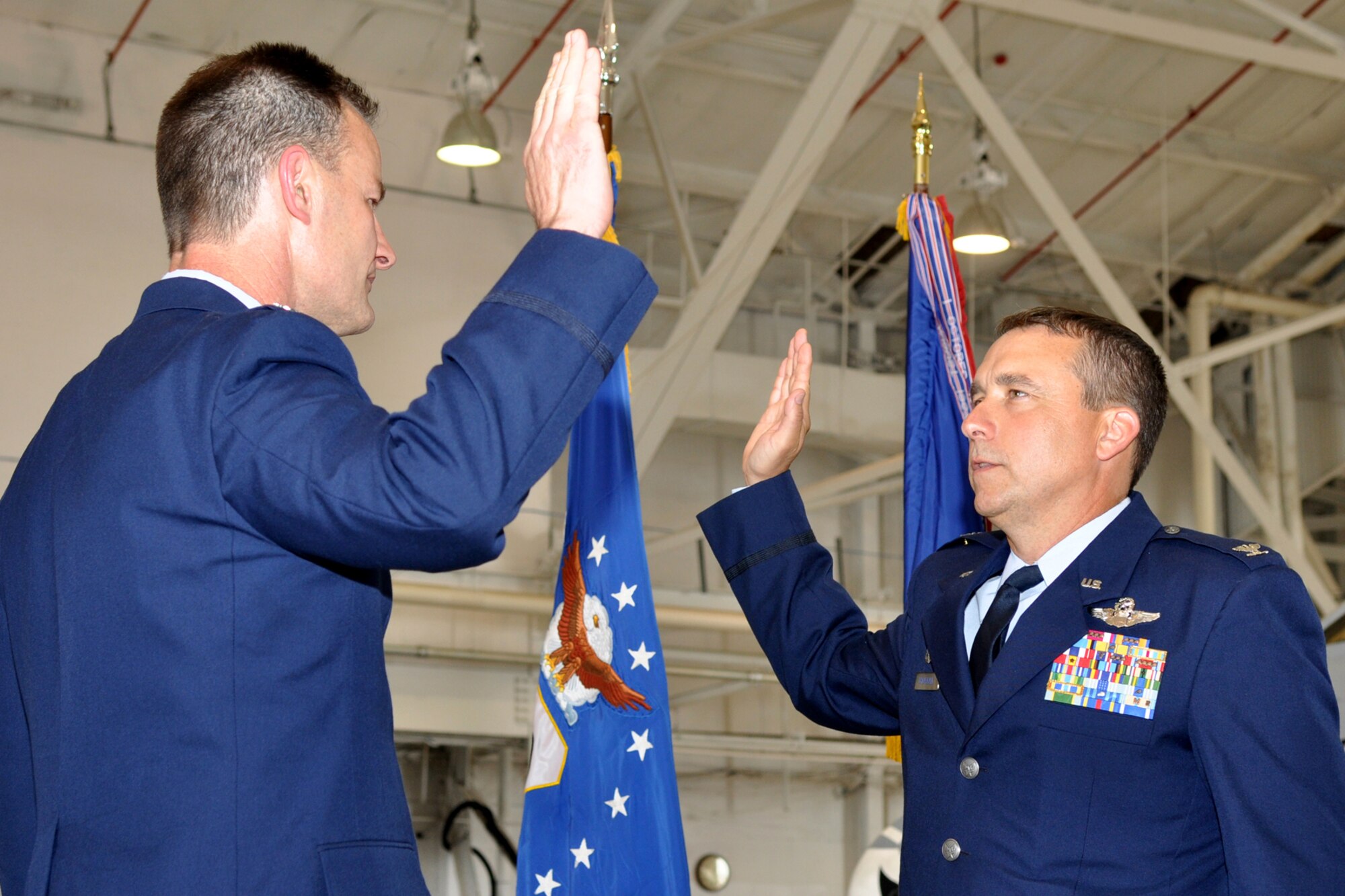 Colonel John Breazeale, takes the oath during his pinning-on ceremony held Friday, June 10, 2011, in the A-10 hangar at Barksdale Air Force Base, La. Approximately 70 family members, friends and civic leaders were in attendance for the event. Immediately following his pinning on, Colonel Breazeale assumed command of the 917th Fighter Group at Barksdale AFB. (U.S. Air Force photo/Tech. Sgt. Jeff Walston)