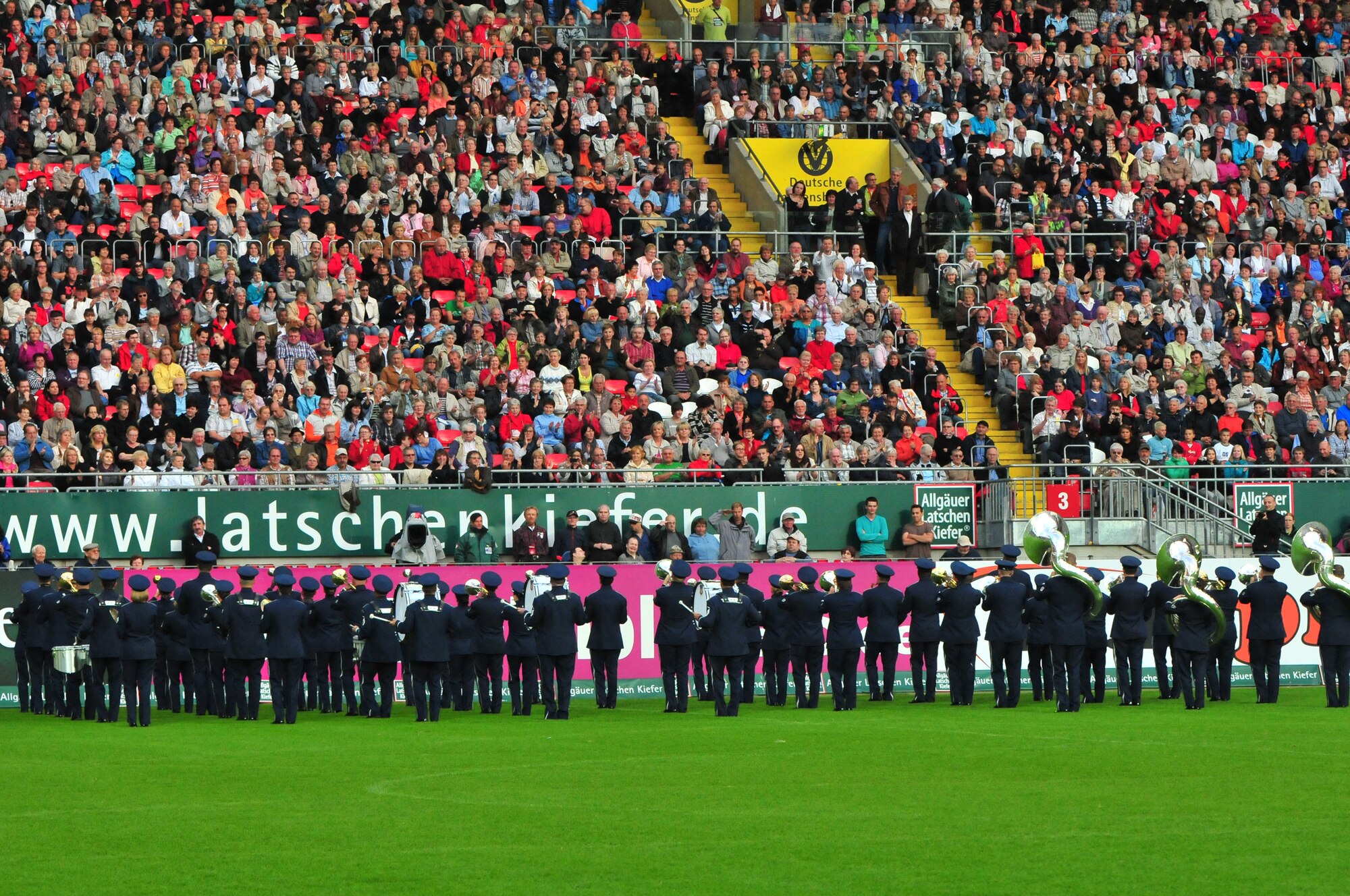 USAFE Band members perform four musical selections during the 22nd Annual NATO Musikfestival, Fritz-Walter Stadion, Kaiserslautern, Germany, June 11, 2011.  Military musicians and bands from seven different nations performed musical selections influenced by their nation's culture and individual music styles for a crowd of more than 8,000 during the fest.  (U.S. Air Force Photo by Tech. Sgt. Chenzira Mallory)