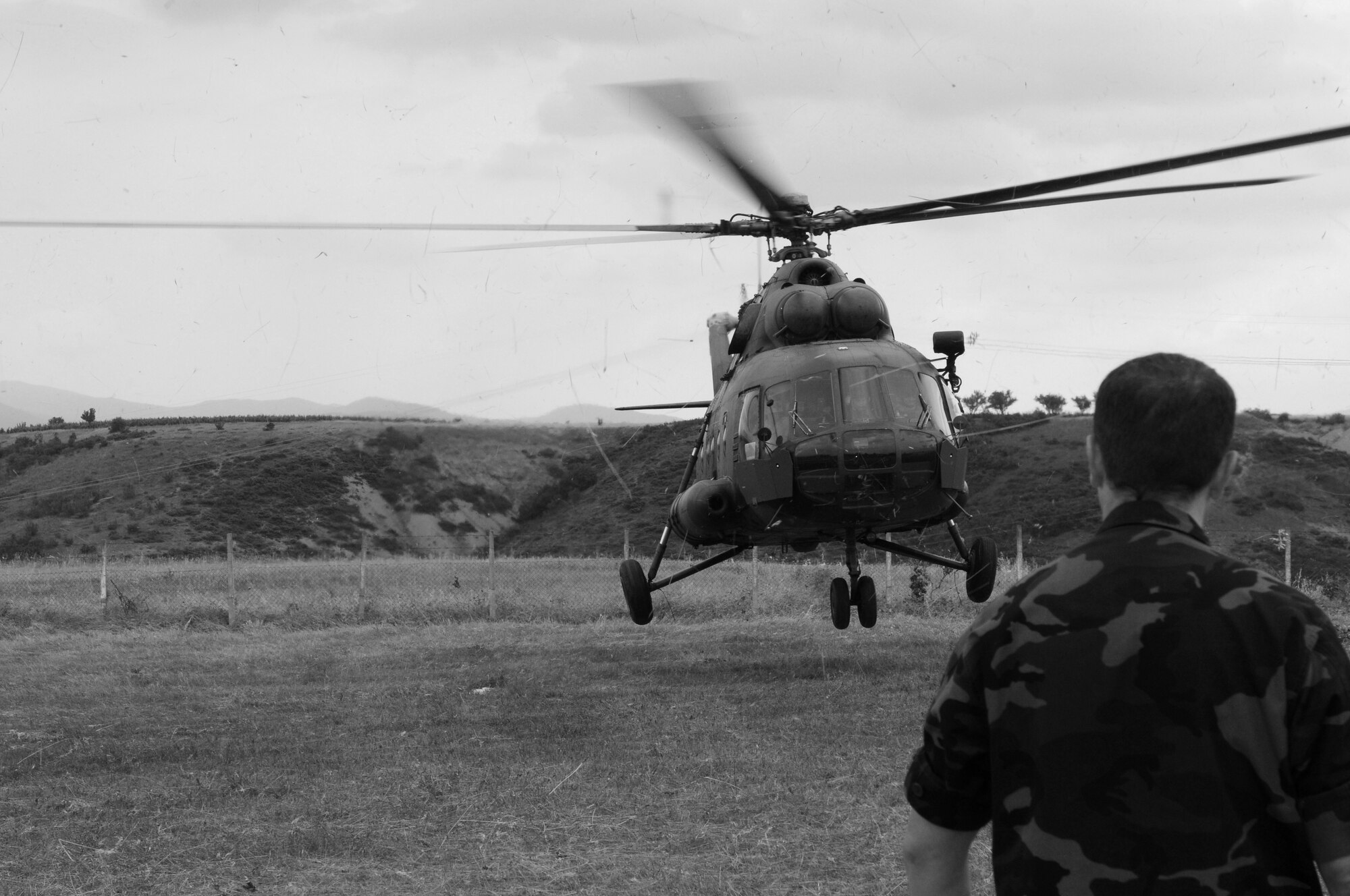 CAMP PEPELISHTE, Macedonia -- Multinational medical personnel race to a Macedonian MI-17 with a simulated trauma patient as part of a medical transport flight on a patient during the 2011 Medical Training Exercise in Central and Eastern Europe live exercise June 12. An annual Chairman of the Joint Chiefs of Staff-sponsored regional and multilateral exercise, MEDCEUR is designed to provide medical training and operational experience in a deployed environment for U.S. and partner nations. The countries participating in this year's MEDCEUR are Macedonia, Montenegro, Bosnia and Herzegovina, Serbia, Slovenia and Norway. (U.S. Air Force photo/Master Sgt. Kelley J. Stewart)