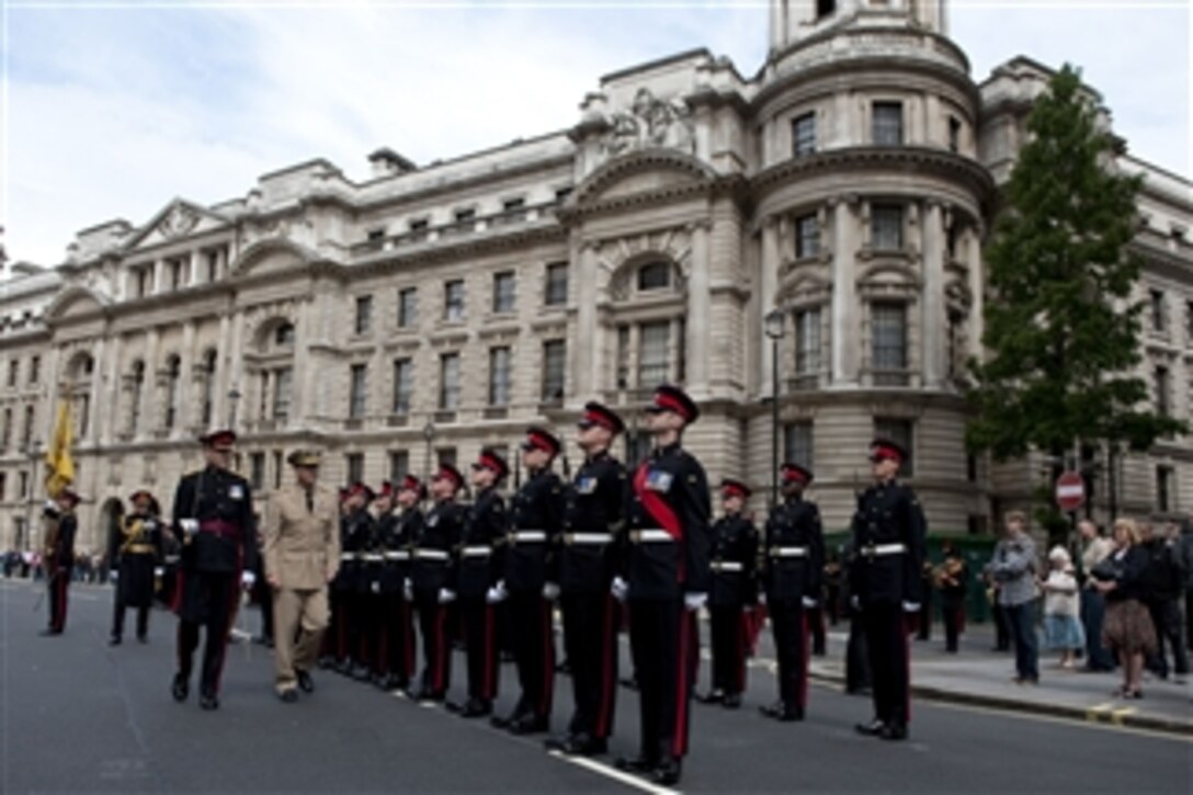 Chairman of the Joint Chiefs of Staff Adm. Mike Mullen reviews British troops during a ceremony welcoming him to London, England, on June 10, 2011.  Mullen is on a seven-day trip visiting Egypt, Germany and England to meet with counterparts and leaders.  