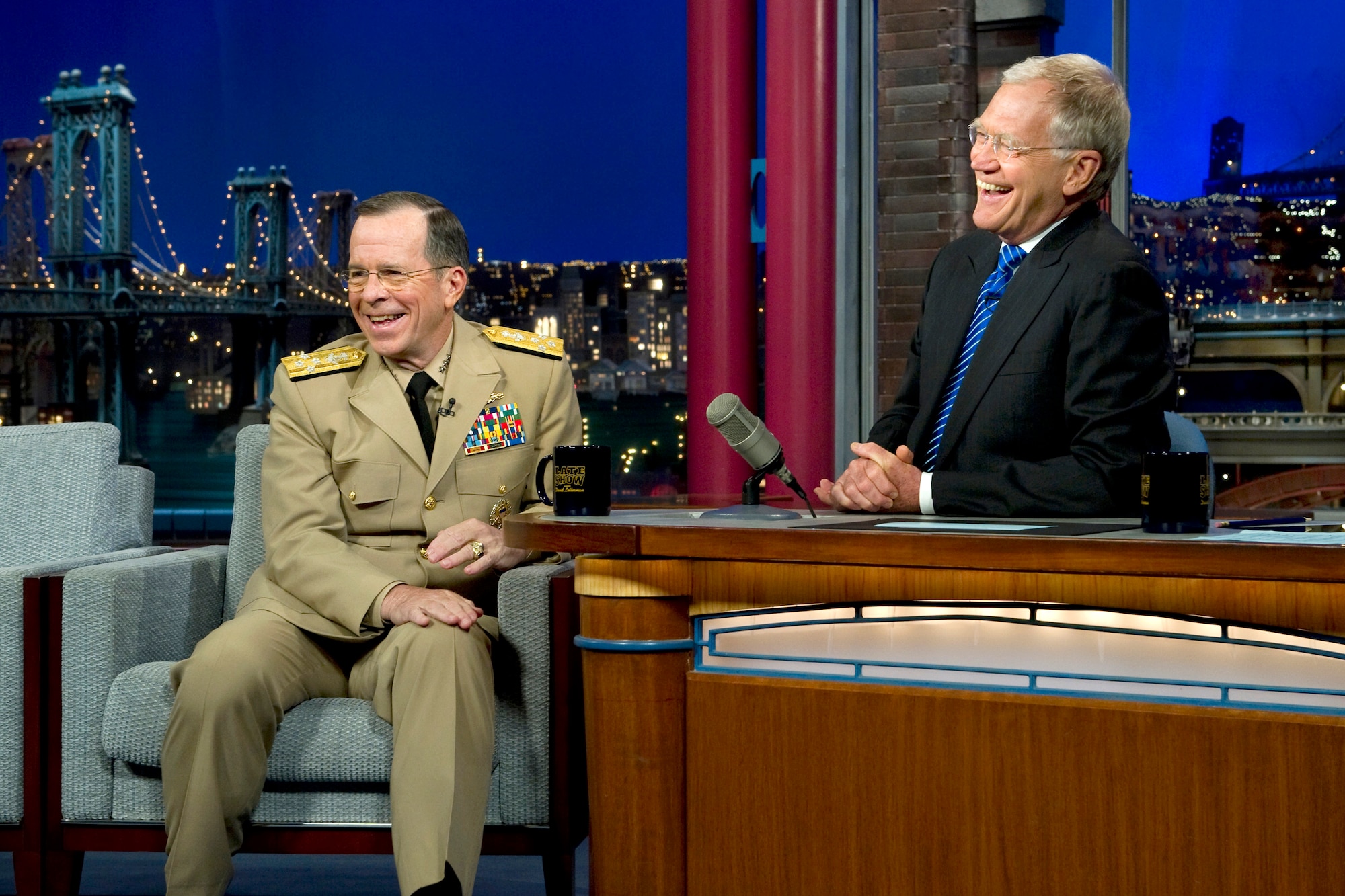 Navy Adm. Mike Mullen, the chairman of the Joint Chiefs of Staff, shares a laugh with host David Letterman June 13, 2011, during an interview on the "Late Show with David Letterman" in New York. (DOD photo/Petty Officer 1st Class Chad McNeeley)