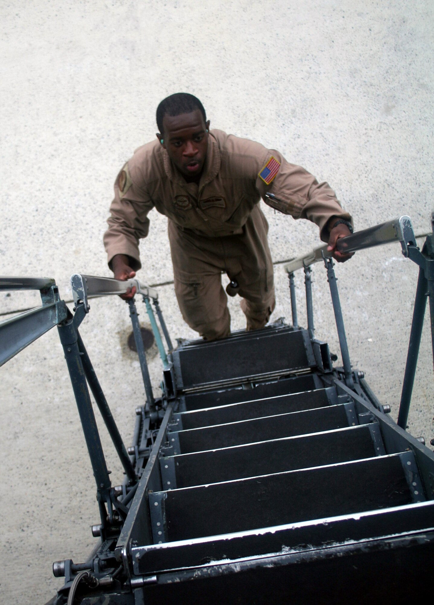 Staff Sgt. Norterious Jenkins, C-5 Galaxy loadmaster, works in a C-5M Super Galaxy on June 5, 2011, prior to departing for a direct delivery airlift mission through the Arctic Circle from Dover Air Force Base, Del., to Bagram Airfield, Afghanistan. Sergeant Dumanhog was one of 14 crewmembers who flew the mission. He is from the 9th Airlift Squadron at Dover AFB and his hometown is  Columbia, S.C.  (U.S. Air Force Photo/Master Sgt. Scott T. Sturkol)