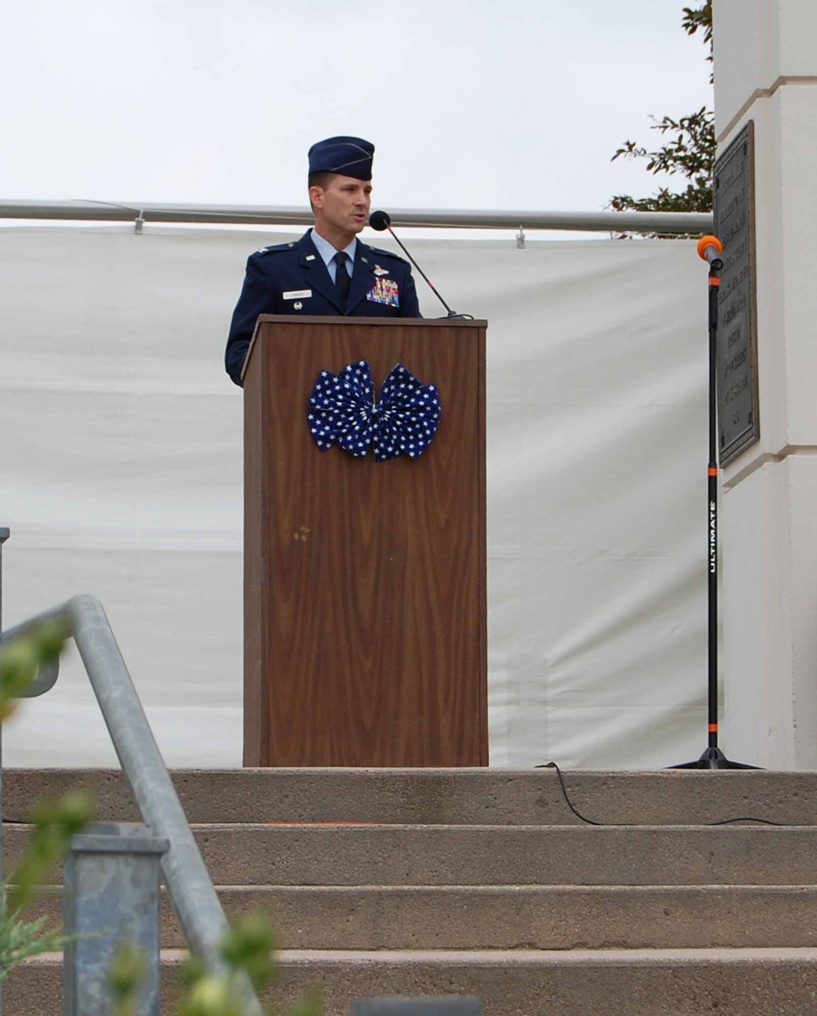 OMAHA, Neb. -- Col. William Jensen, 55th Wing vice commander, addresses the crowd at Memorial Park June 4, as part of an event at the Traveling Vietnam Veterans Memorial and Museum that made a stop here from May 29 - June 5. The traveling wall is a half-scale replica of the actual Vietnam Veterans Memorial in Washington D.C. It stretches nearly 250 feet in length and is displayed at different locations around the country throughout the year. (Air Force photo by Ryan Hansen/Released)