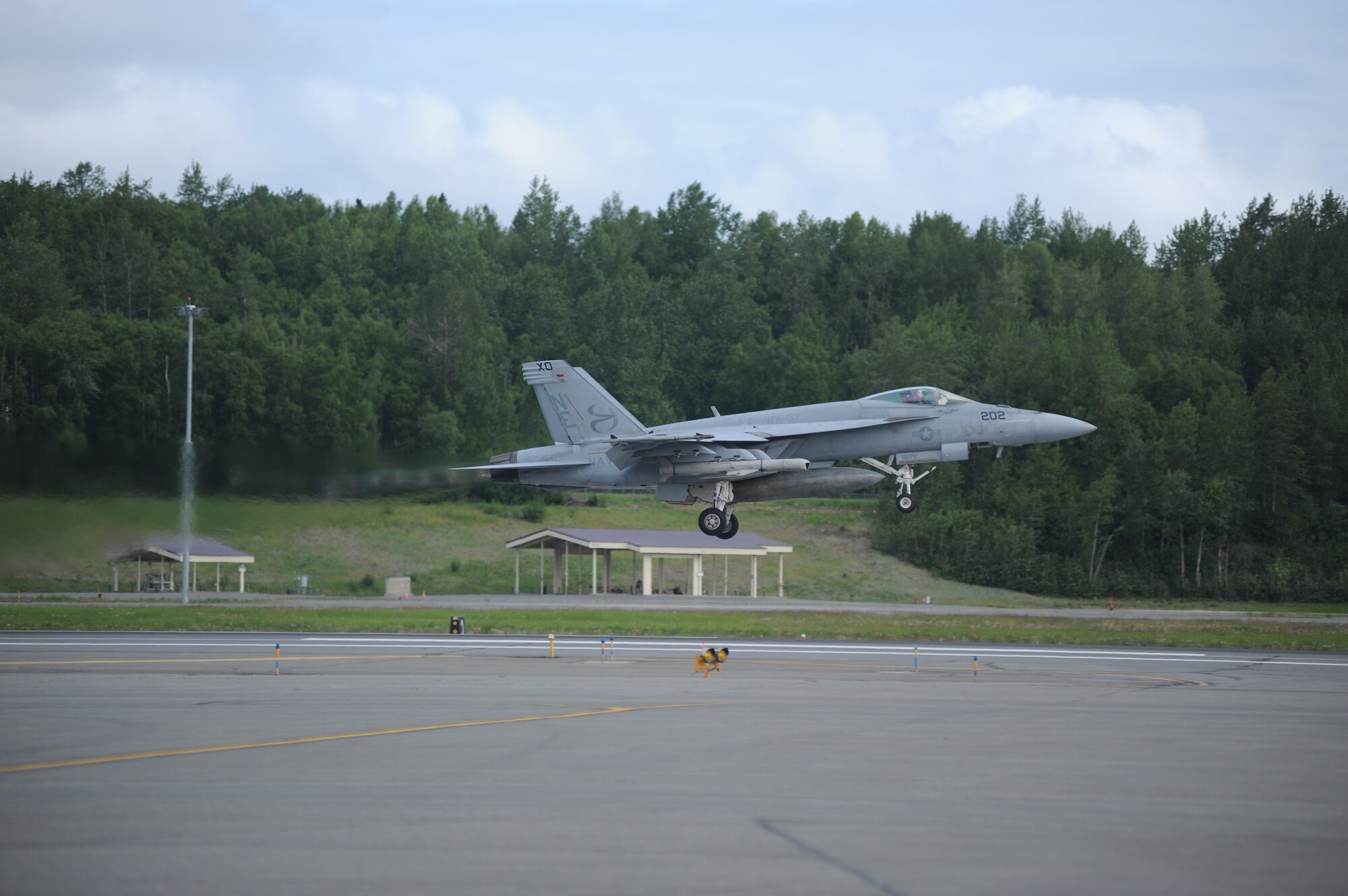 JOINT BASE ELMENDORF RICHARDSON, Alaska --  An F/A-18F Super Hornet takes off to participate in the first training mission of Operation Northern Edge 11 in JBER, Alaska, June 13, 2011. Northern Edge, Alaska's largest military training exercise, is designed to prepare joint forces to respond to crises throughout the Asia-Pacific region. (Photo by Mass Communication Specialist 2nd Class Rufus Hucks)