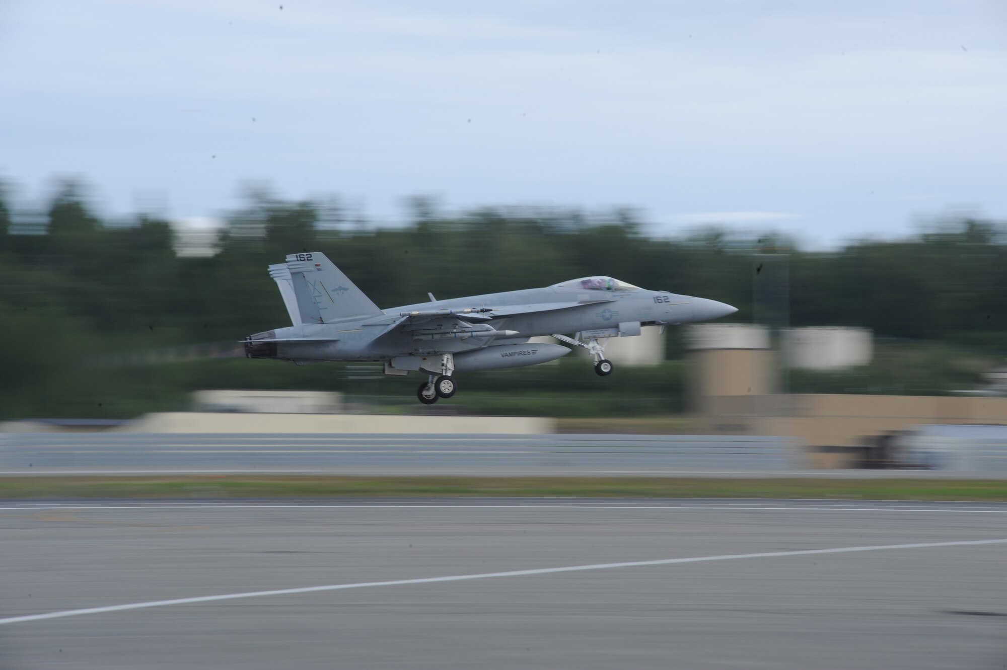 JOINT BASE ELMENDORF RICHARDSON, Alaska --  An F/A-18F Super Hornet takes off to participate in the first training mission of Operation Northern Edge 11 in JBER, Alaska, June 13, 2011. Northern Edge, Alaska's largest military training exercise, is designed to prepare joint forces to respond to crises throughout the Asia-Pacific region. (Photo by Mass Communication Specialist 2nd Class Rufus Hucks)