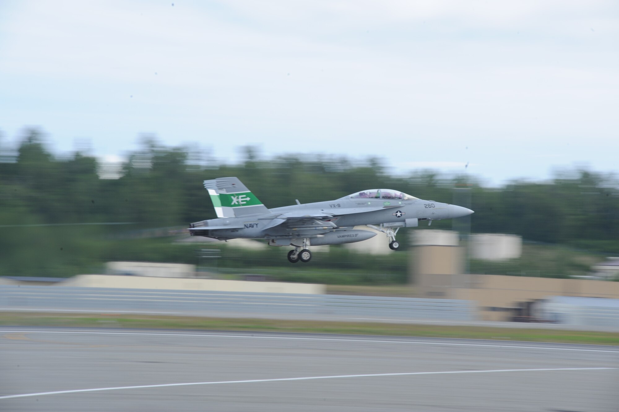 JOINT BASE ELMENDORF RICHARDSON, Alaska --  An F/A-18F Super Hornet takes off to participate in the first training mission of Operation Northern Edge 11 in JBER, Alaska, June 13, 2011. Northern Edge, Alaska's largest military training exercise, is designed to prepare joint forces to respond to crises throughout the Asia-Pacific region. (Photo by Mass Communication Specialist 2nd Class Rufus Hucks)