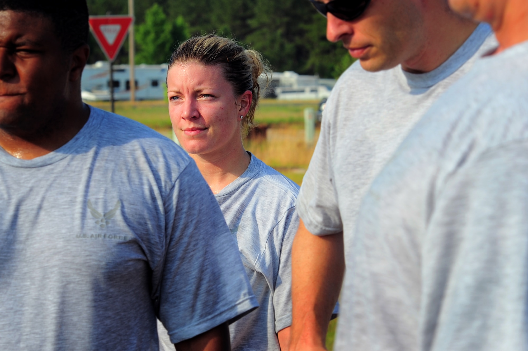 SHAW AIR FORCE BASE, S.C. -- Capt. Sarah Eccles, 682nd Air Support Operations Squadron air liaison officer, listens to the morning brief from the squadron commander with other 682nd ASOS members after squadron physical training. Captain Eccles is also an F-16 pilot who is currently on a non-flying status while she is on her alpha tour as an ALO. (U.S. Air Force photo/Airman 1st Class Daniel Phelps)