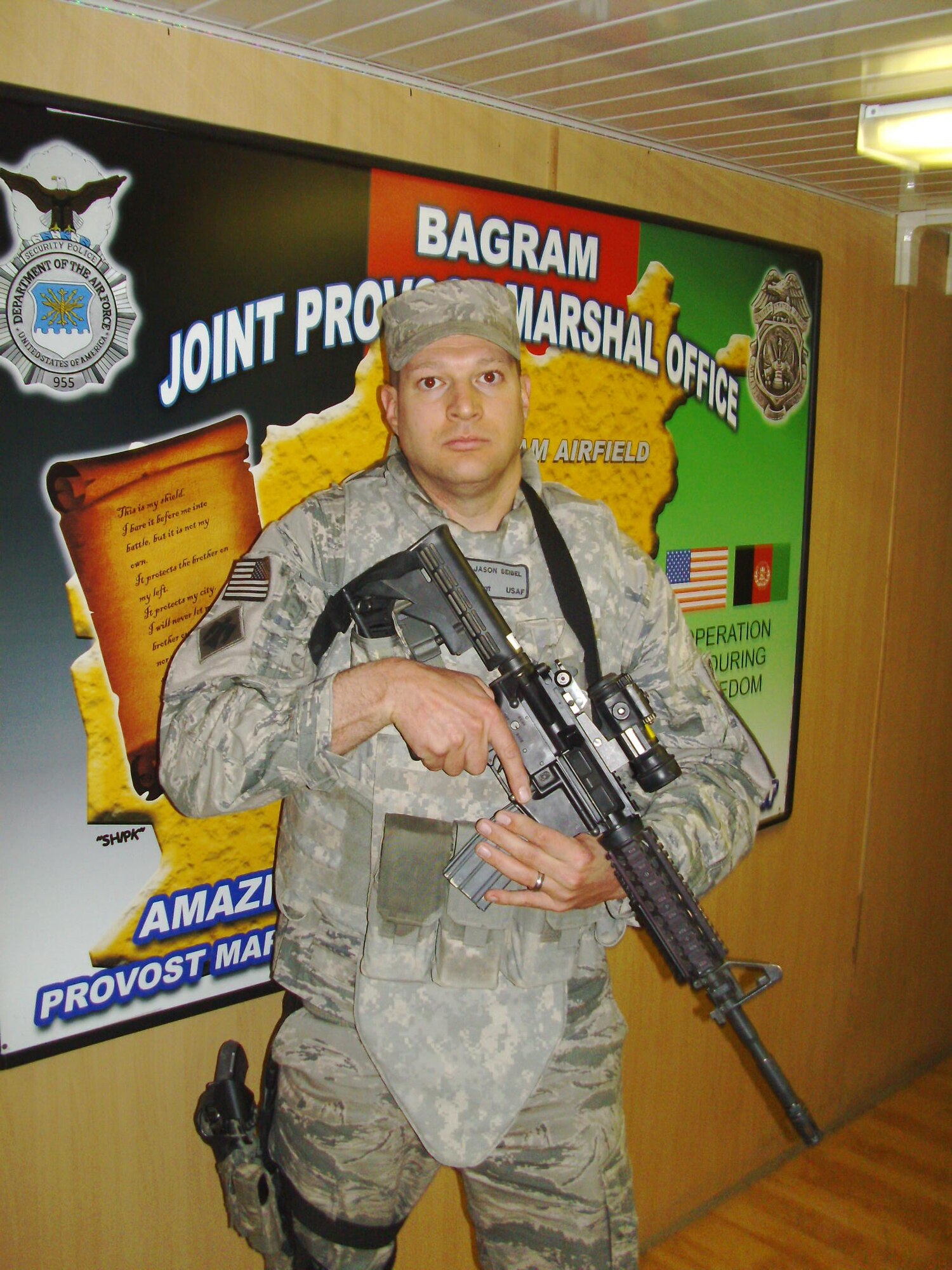 Master Sgt. Jason Seibel stands proud at Bagram Airfield, Afghanistan June 13. He is deployed from Fairchild in support of Operation Enduring Freedom with the U.S. Army 1st Calvary Division. He, along with other security forces is responsible for the security of more than 36,000 people.