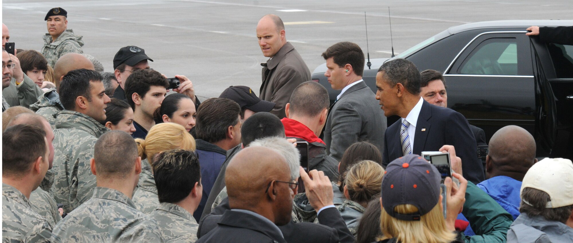 President Barack Obama greets members of the 103rd Airlift Wing, Connecticut Air National Guard, on the edge of the ramp at Bradley Air National Guard Base, East Granby, Conn. May 18, 2011, after deplaning Air Force One.  The Commander in Chief had a brief stop over here before traveling by motorcade to New London to address graduating cadets at the U.S. Coast Guard Academy. (U.S. Air Force photo by Airman 1st Class Emmanuel Santiago)