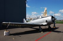 BC-lA/AT-6A Texan - In the summer of 1938, the 109th Squadron was assigned the BC-lA as a transition aircraft before flying the O-47. Re-designated the AT-6, it was again assigned after W.W.II as an instrument trainer for pilots of both the 109th and 179th Squadrons. The T-6 "Texan" is an advanced trainer and the majority of World War II Allied pilots received their flight train in the this aircraft. It was designated SNJ by the Navy and the RAF called it the Harvard. On takeoff it has a distinctive roar as the propeller blade tips exceed the speed of sound. A total of 15,495 aircraft were build and used to train several hundred thousand pilots of 34 countries. The museum BC-1 has the markings of the 109th Observation Squadron of the period. 
Dimensions
Fuselage Length: 29ft. 6in.
Wing Span: 42ft. 0.25in.
Height: 11ft. 9in.

