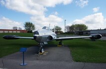 This Lockheed-built two-place trainer was originally intended to train pilots to fly jets. The T-33 is derivative of the P-80 which was the Air Force’s first operational jet fighter. The T-33A is a F-80 with a lengthened fuselage to make room for the second tandem seat. It entered service during the 1950s . It was used to transition pilots from propeller-driven aircraft to jets, and to train pilots in instrument flying. Both the 109th and the 179th Squadrons used T-birds at various times. It remained in inventory until the late 1960s. The museum T-33 has the colors of the 109th FIS on the wing tip tanks. 
Dimensions
Fuselage Length: 37ft. 9in.
Wing Span: 38ft. 10 1/2in.
Height: 11ft. 8in.

