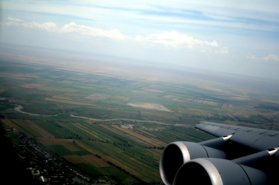 Thne countryside of Kygyzstan can be seen through the window of a C-5M Super Galaxy during an airlift mission on June 7, 2011.  (U.S. Air Force Photo/Master Sgt. Scott T. Sturkol)