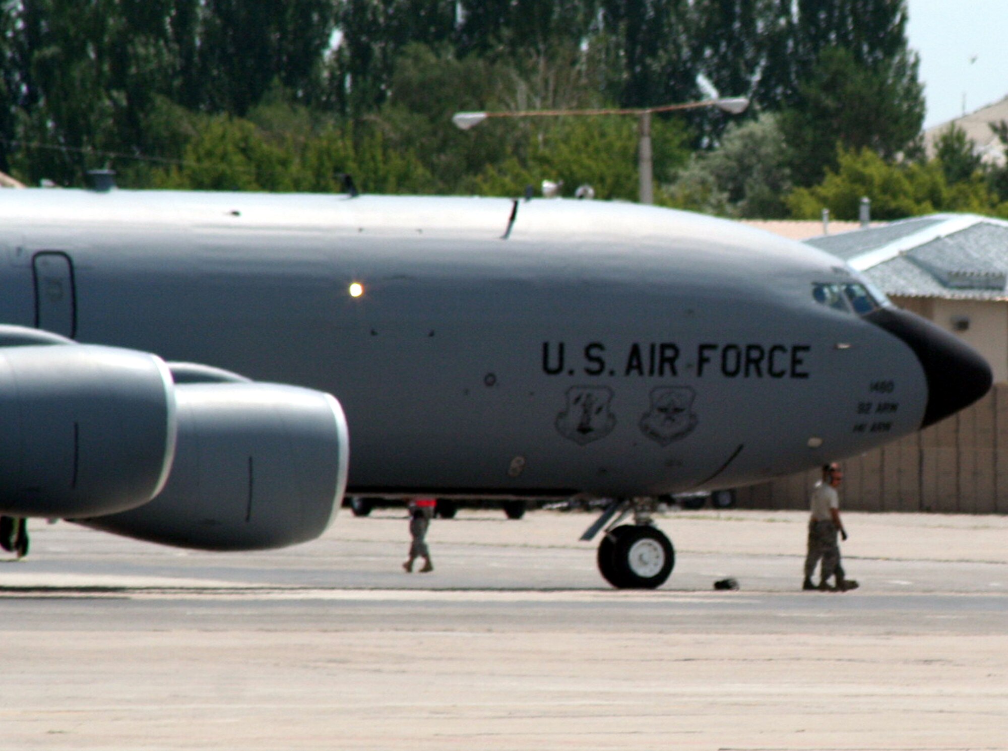 Aircraft maintenance Airmen assigned to the 376th Air Expeditionary Wing prepare a KC-135R Stratotanker for a combat air refueling mission from the Transit Center at Manas, Kyrgyzstan, on June 7, 2011. The 376th AEW supports Operation Enduring Freedom and other operations in the U.S. Central Command area of responsibility. (U.S. Air Force Photo/Master Sgt. Scott T. Sturkol)
