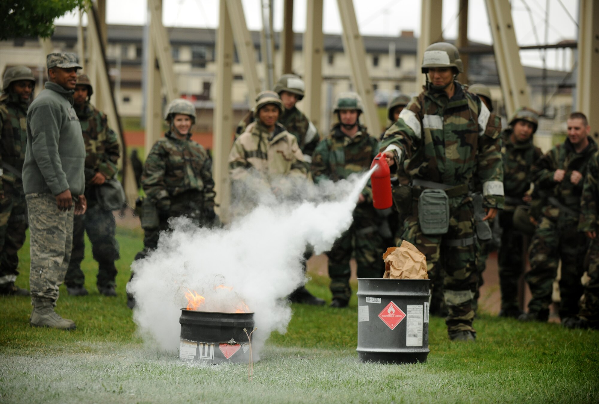 SPANGDAHLEM AIR BASE, Germany – An Airman from the 52nd Fighter Wing extinguishes a fire during individual core competency skills training here June 13. The training reviewed individual chemical, biological, radiological and nuclear defense; weapon familiarization; first aid; and firefighting to prepare Airmen to operate in hostile environments. (U.S. Air Force photo/Senior Airman Nathanael Callon)