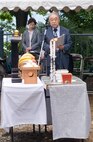 SHIZUOKA CITY, Japan -- Dr. Hiroya Sugano, host of the annual B-29 remembrance ceremony, welcomes guests with an opening speech at Shizuoka City, Japan, June 11, 2011. Members from Yokota Air Base, Japan, attended the ceremony that honors the 23 fallen aircrew that died June 20, 1945 when two B-29s collided mid-air during an air raid on the city. (U.S. Air Force photo/Airman John D. Partlow)