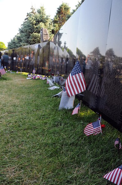 OMAHA, Ne. -- The Traveling Vietnam Veterans Memorial Wall displays the names of more than 58,000 Americans who died in the conflict. It was on display here at Memorial Park from May 29 - June 5. (Air Force photo by Kendra Williams/Released)