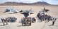 Members of the 98th Range Wing pose for a group photo on the Nellis Air Force Base flightline March 15. The 98th RANW was activated at Nellis Oct. 29, 2001 to operate, maintain and manage the NTTR complex.  On June 21, 2011, the 98th RANW was re-designated as The Nevada Test and Training Range -- a direct reporting unit to the U.S. Air Force Warfare Center. (U.S. Air Force photo by Airman 1st Class Jamie Nicley/Released) 
