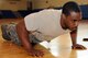 KUNSAN AIR BASE, Republic of Korea -- Staff Sgt. Prentice Sanders, 8th Operations Support Squadron air traffic controller, participates in the First Sergeant’s Push-Up Challenge at the Fitness and Sports Center here June 15. The challenge is to try to do as many Air Force style push-ups as possible in 10 minutes. Sergeant Sanders finished with 407 push-ups, also winning in the under 30 males category. (U.S. Air Force photo/Senior Airman Ciara Wymbs)