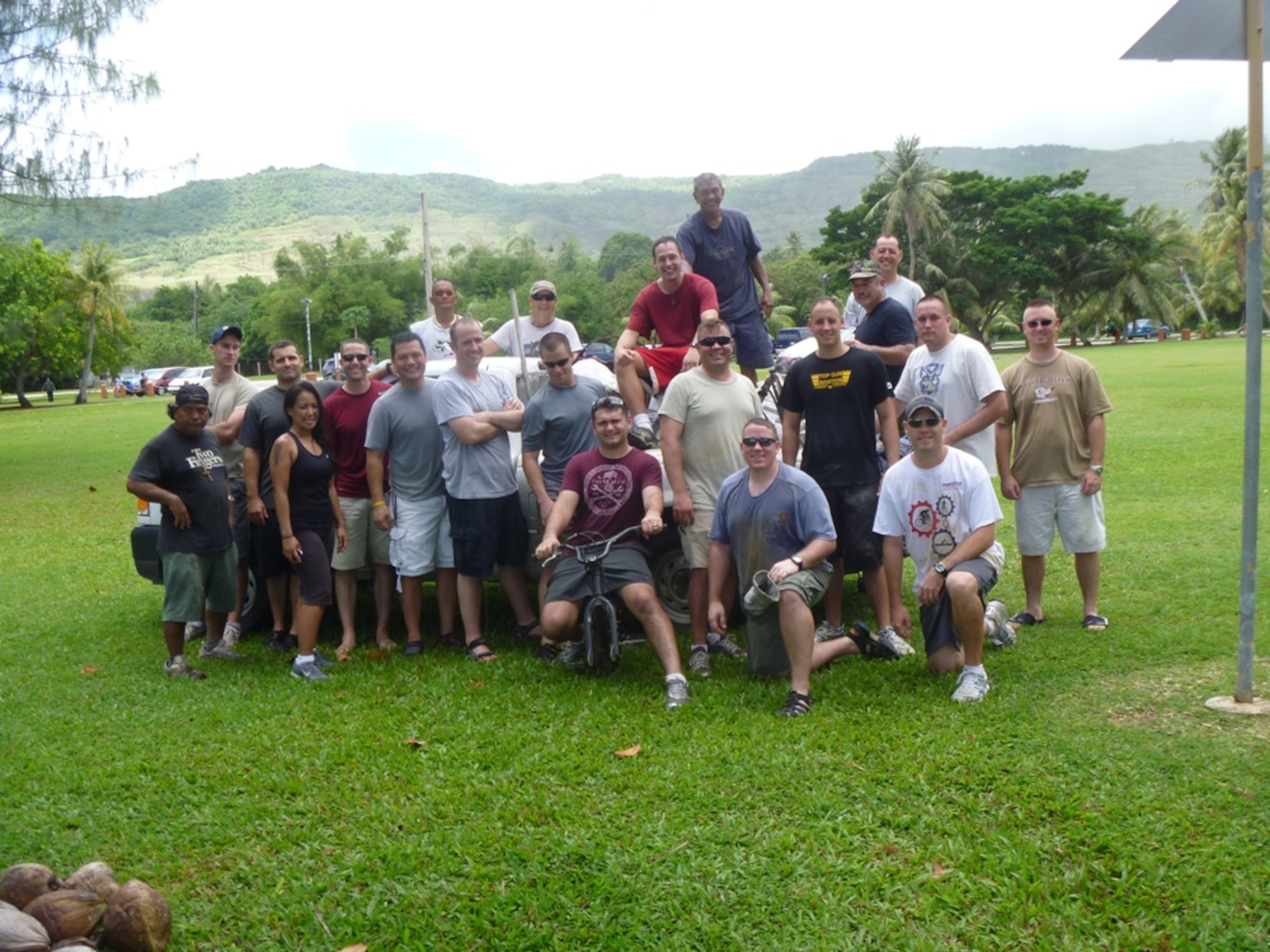 Members of the 96th Expeditionary Bomb Squadron, deployed here in support of Pacific Command's Continuous Bomber Presence, posed after conducting a clean-up at Nimitz Beach. The unit has undertaken a 9+6 Beach Cleanup project aimed at cleaning nine coastal village beaches and six military beaches on the island. 