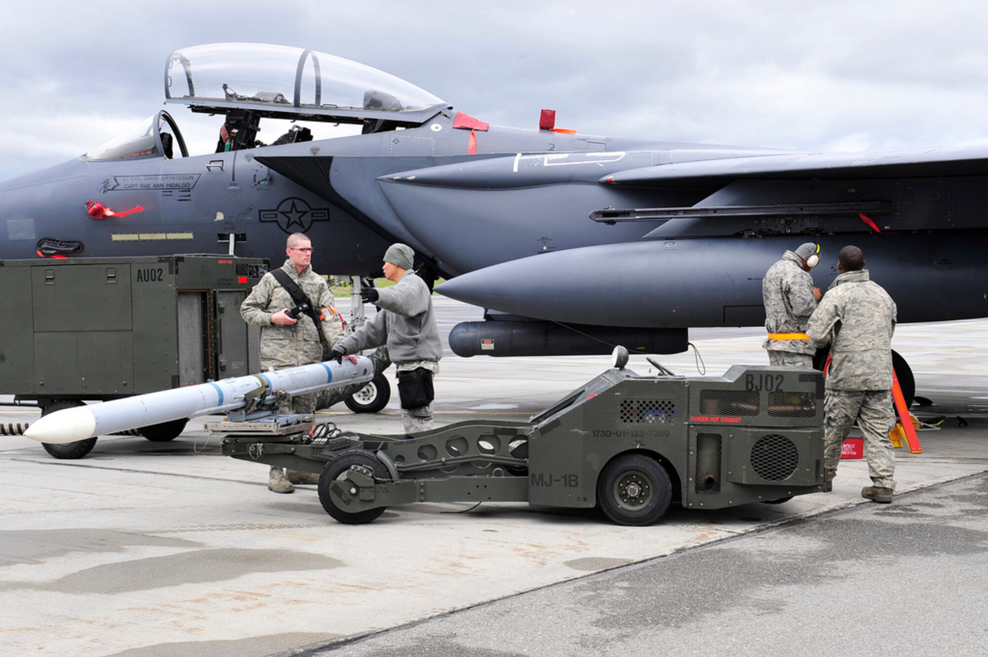 Members of the 391st Aircraft Maintenance Unit "Tigers", from Mountain Home Air Force Base, Idaho, complete a function check on the M-9 system of an F-15 Eagle, during the Northern Edge Premier Joint Training Exercise at Eielson Air Force Base, June 13.  Northern Edge focuses on tactical-level execution of U.S. Pacific Command training modules in a joint training environment. (U.S. Air Force photo/Staff Sgt. Lakisha A. Croley)