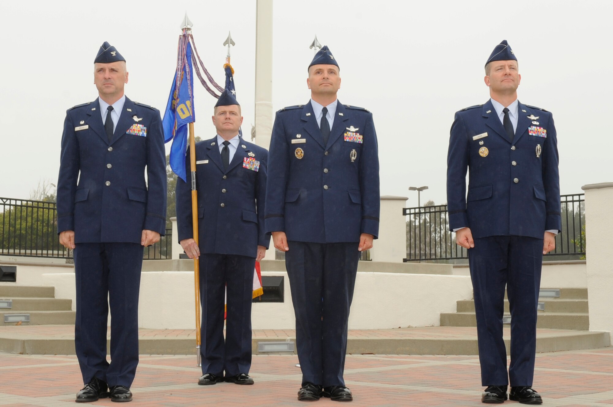 VANDENBERG AIR FORCE BASE, Calif. – Col. Richard Boltz, the 30th Space Wing commander, presided over the 30th Operations Group change of command ceremony in which Col. Todd Gossett, the 30th OG former commander, relinquishes command to by Col. David Hook, the 30th OG commander here Wednesday, June 15, 2011. (U.S. Air Force photo/Senior Airman Lael Huss)
