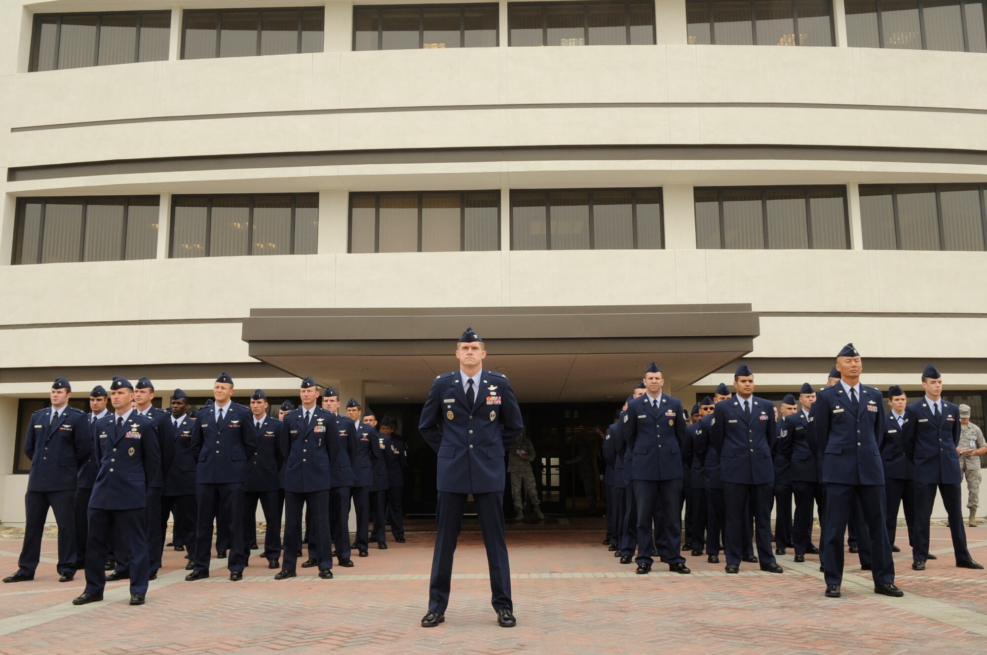 VANDENBERG AIR FORCE BASE, Calif. – Two squadrons under the 30th Operations Group stand in formation during the change of command ceremony here Wednesday, June 15, 2011. During the ceremony, the new commander receives their first solutes from their Airmen. (U.S. Air Force photo/Senior Airman Lael Huss)