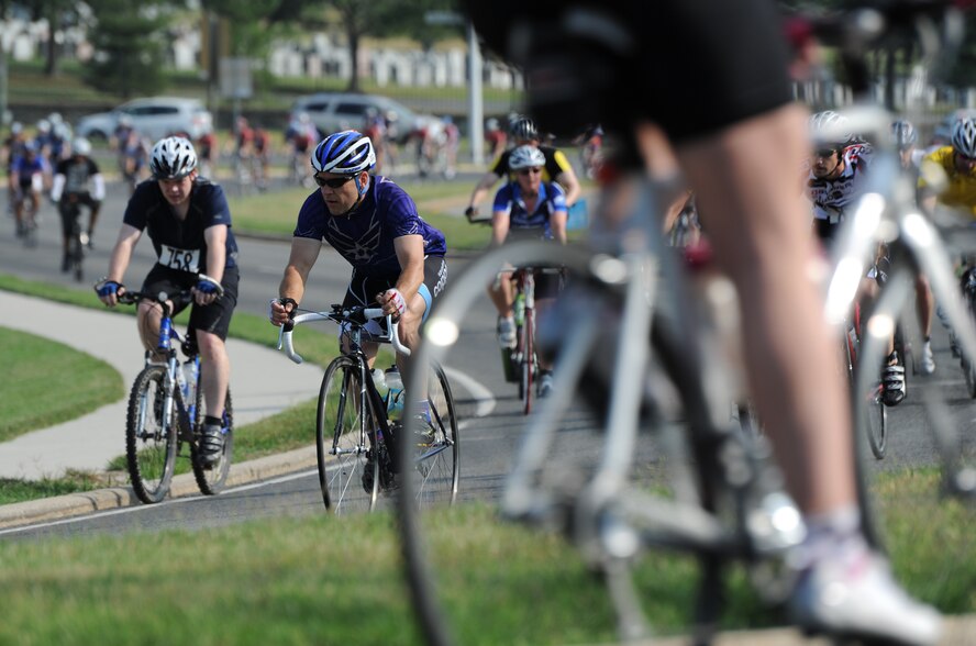 More than 1,600 registered cyclists in the Crystal Ride Challenge endured a 12.5 kilometer course around the Pentagon, Air Force Memorial and Crystal City in Northern Virginia, June 12, 2011. The Crystal Ride Challenge was one of several races conducted during the Air Force Cycling Classic. While some riders participated in the Crystal Ride Challenge for fun and fitness, other competitors in teams rode to raise money for charity. A group of riders who registered to be a part of Team Sabre raised $20,000 for the Air Force Aid Society. (U.S. Air Force photo by Master Sgt. Tracy L. DeMarco) (Released)