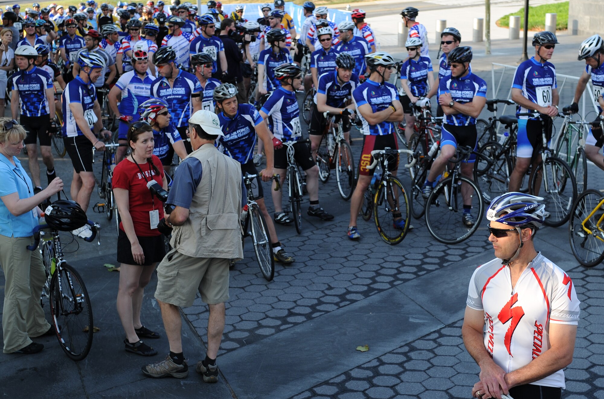Col. Vinny “Otter” Lostetter (wearing the white jersey), Chief, Current Operations Division, J36 of the Joint Chiefs of Staff, waits for the start of the Air Force Cycling Classic, Corporate/Team Challenge Ride, June 12, 2011, Air Force Memorial, Arlington, Va. This is the first time that Colonel Lostetter rode in the Air Force Cycling Classic. “I ride for fun and fitness,” Colonel Lostetter said. (U.S. Air Force photo by Master Sgt. Tracy L. DeMarco) (Released)