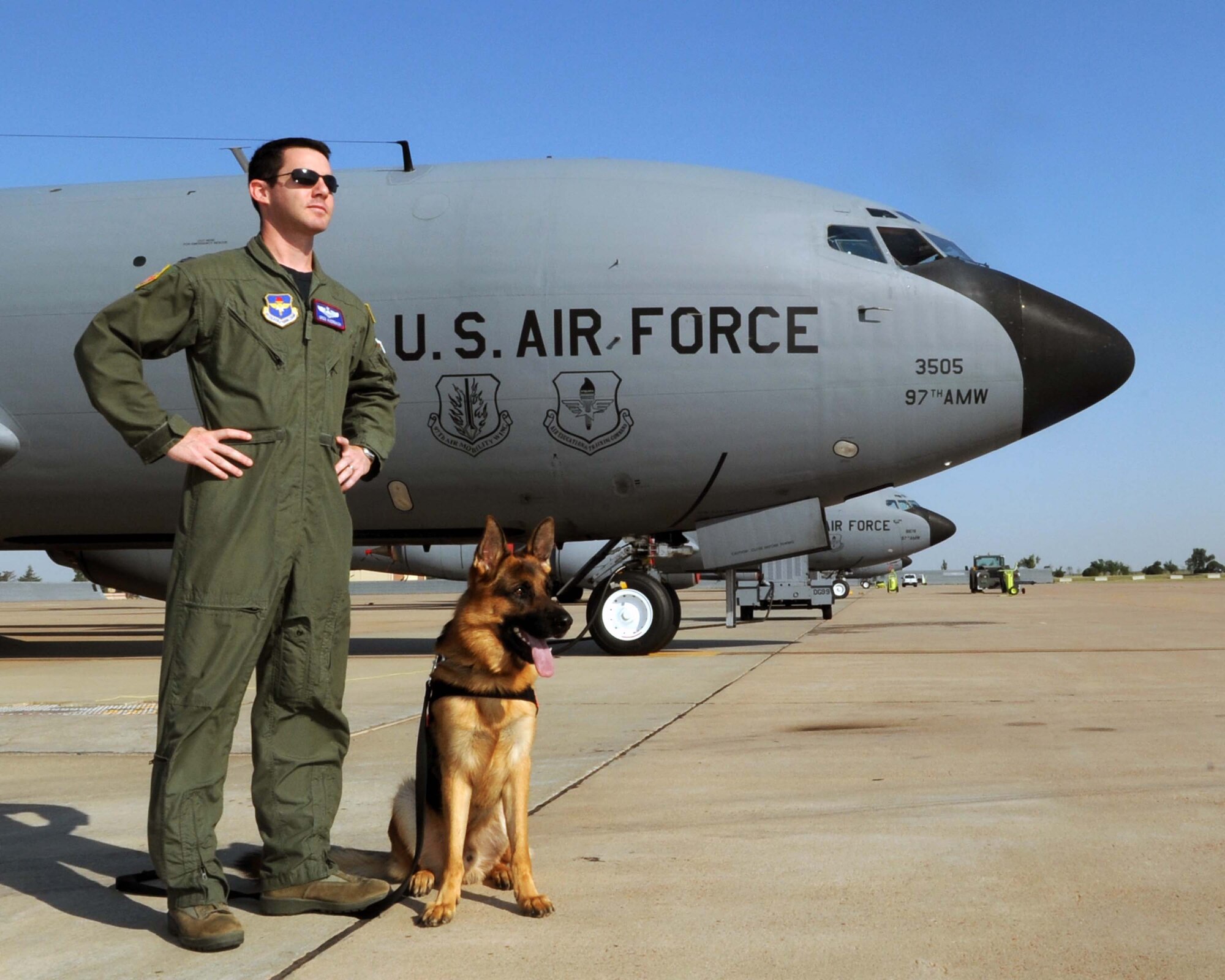 ALTUS AIR FORCE BASE, Okla. – Capt. Greg Auerbach, 54th Air Refueling Squadron KC-135 Stratotanker instructor pilot, and his German Sheppard, Ronnie, were one of three K-9 Search and Rescue handler volunteer teams from the Central Oklahoma Search and Rescue that found the body of the missing Piedmont, Okla. boy May 26, 2011. Three-year-old Ryan Hamil was ripped out of a bathtub by a tornado, where he and his family huddled, and landed in a lake 60 yards away May 24, 2011. Training to be a certified search and rescue volunteer takes about a year, and training and certifying a dog takes one to two years. (U.S. Air Force photo by Senior Airman Leandra D. Stepp / 97th Air Mobility Wing Public Affairs / Released)