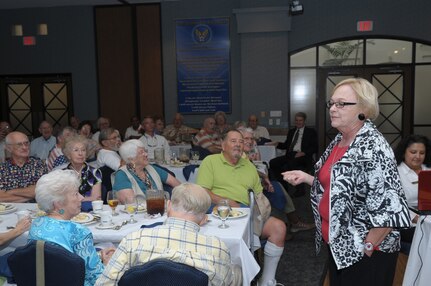Judith Markelz, Warrior and Family Support Center Director, Fort Sam Houston, Texas, speaks to members of Hangar Doors are Open, 15 June.  The center provides many programs and promotes donations for its wounded warriors. (U.S. Air Force photo/Joel Martinez)