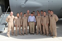 On a recent trip, Airmen from Joint Base Charleston flew Secretary of Defense Robert Gates on an overseas mission throughout Afghanistan and then from Belgium to Andrews Air Force Base. Pictured front row left to right are: Senior Airman Zach Asman from the 437th Security Forces Squadron, Staff Sgt. John Diaz-Colon, 437 SFS, Staff Sgt. Jessica Dial, 437th Aircraft Maintenance Squadron, Secretary of Defense Robert Gates, Capt. Jason Sanchez, 15th Airlift Squadron, Staff Sgt. Joseph Burton, 437 SFS and Capt. John Highley, 15 AS. Back row: Airman 1st Class Karl Gifford, 15 AS, Lt. Col. Mike Mitchell, 437th Operations Group, Staff Sgt. Grant Phillips, 15 AS, Staff Sgt. Ethan Hipple, 437 AMXS, Capt. Ben Peacock, 15 AS and Staff Sgt. Derek Southard, 437 SFS. (Secretary of Defense/Kevin Brown)