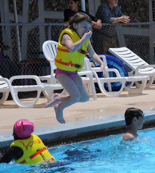 LAUGHLIN AIR FORCE BASE, Texas – A Laughlin youth jumps into Friendship Pool here as part of the free summer camp being offered at Laughlin’s youth center. The camp runs until Aug. 19 and is open to any child five through 12 years old whose parents have access to the base. (U.S. Air Force photo by Airman 1st Class Blake Mize)