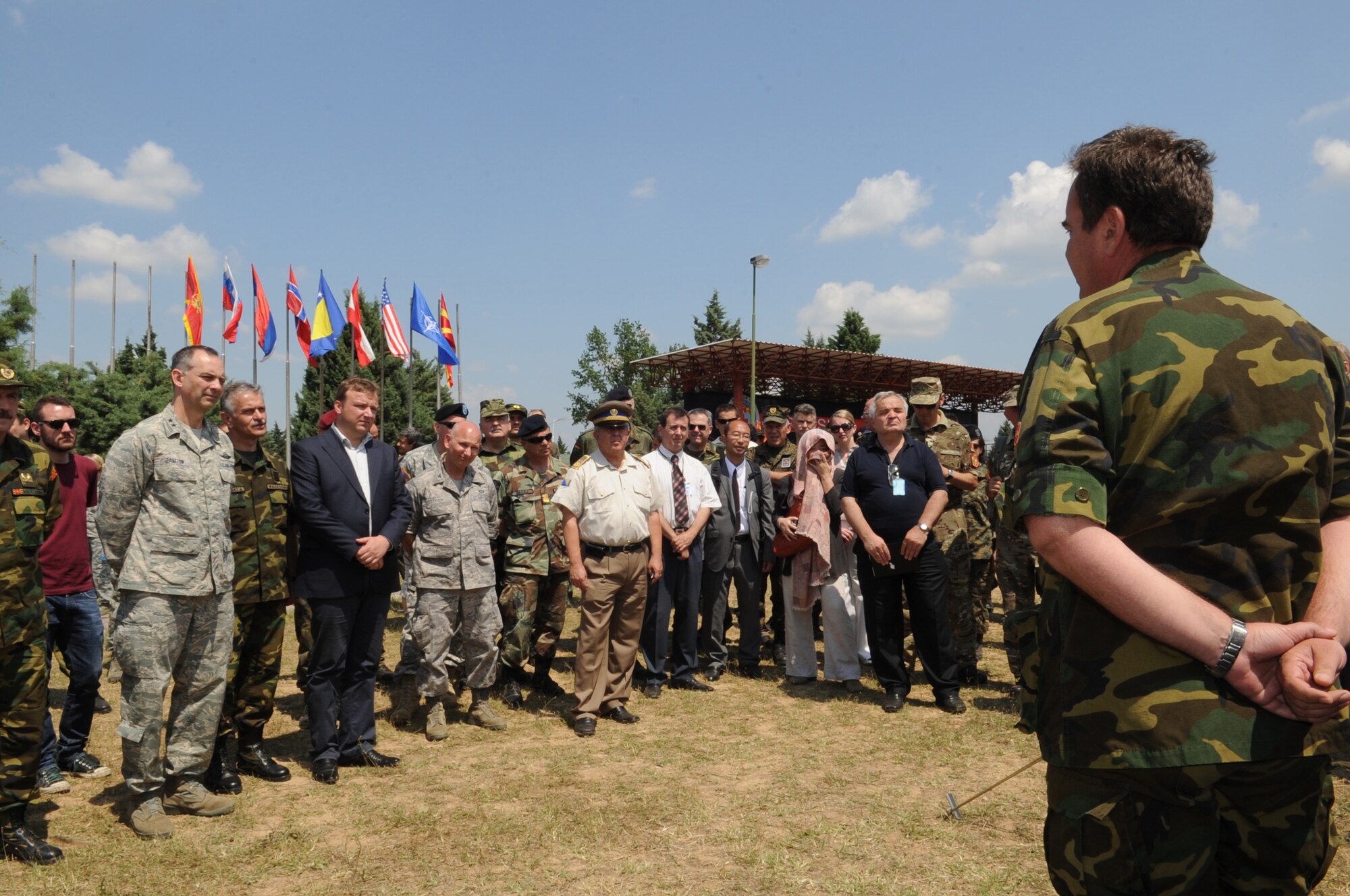 CAMP PEPELISHTE, Macedonia -- Second from left, Maj. Gen. Mark Zamzow, 3rd Air Force vice commander, listens to Macedonian medical personnel explain their field medical capabilities during a showcase for distinguished guests as part of the 2011 Medical Training Exercise in Central and Eastern Europe June 13. An annual Chairman of the Joint Chiefs of Staff-sponsored regional and multilateral exercise, MEDCEUR is designed to provide medical training and operational experience in a deployed environment for U.S. and partner nations. The countries participating in this year's MEDCEUR are Macedonia, Montenegro, Bosnia and Herzegovina, Serbia, Slovenia and Norway. (U.S. Air Force photo/Staff Sgt. Nadine Barclay)