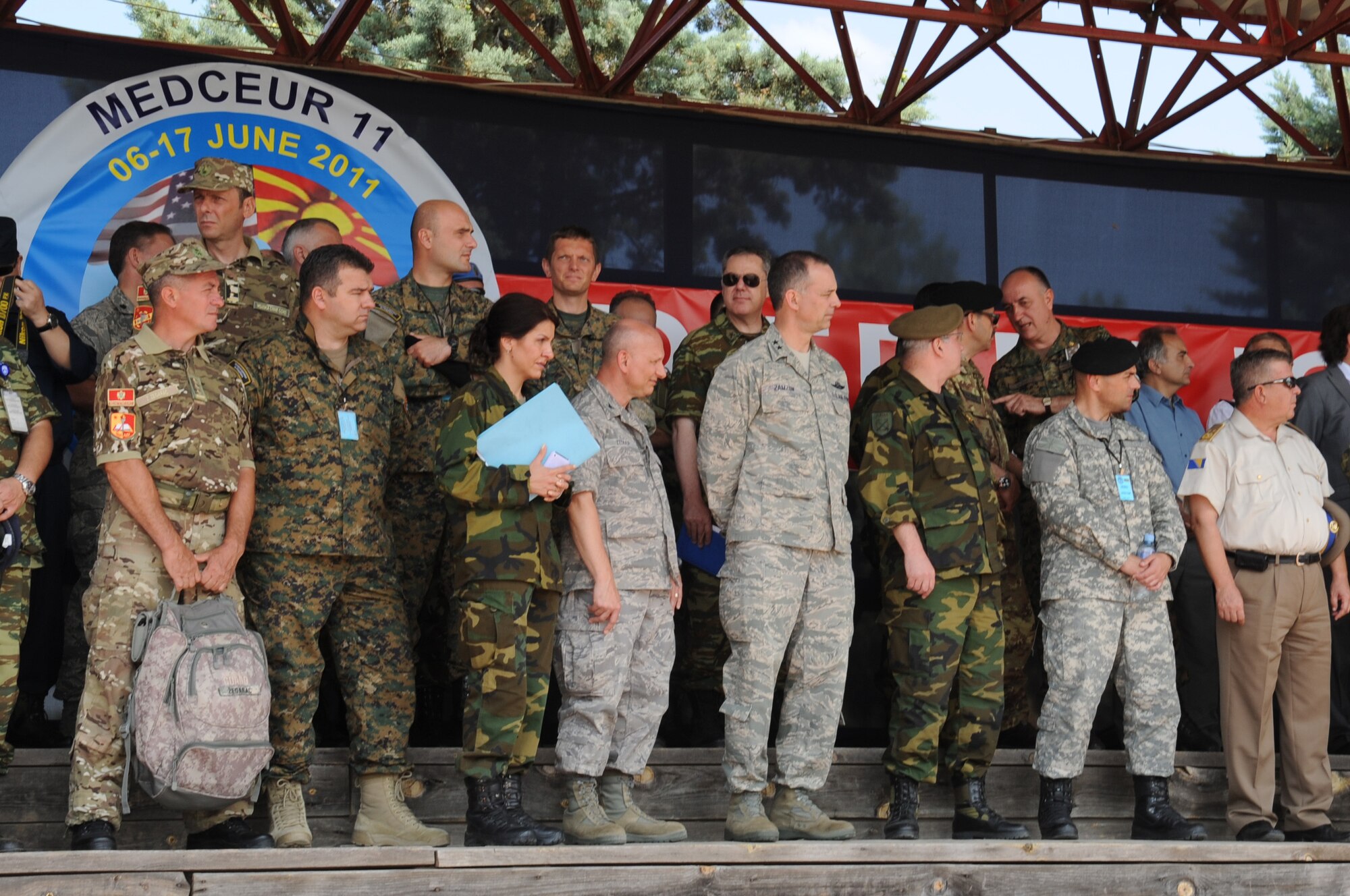 CAMP PEPELISHTE, Macedonia -- Distinguished visitors from various nations watch a demonstration during the 2011 Medical Training Exercise in Central and Eastern Europe June 13. An annual Chairman of the Joint Chiefs of Staff-sponsored regional and multilateral exercise, MEDCEUR is designed to provide medical training and operational experience in a deployed environment for U.S. and partner nations. The countries participating in this year's MEDCEUR are Macedonia, Montenegro, Bosnia and Herzegovina, Serbia, Slovenia and Norway. (U.S. Air Force photo/Staff Sgt. Nadine Y. Barclay)