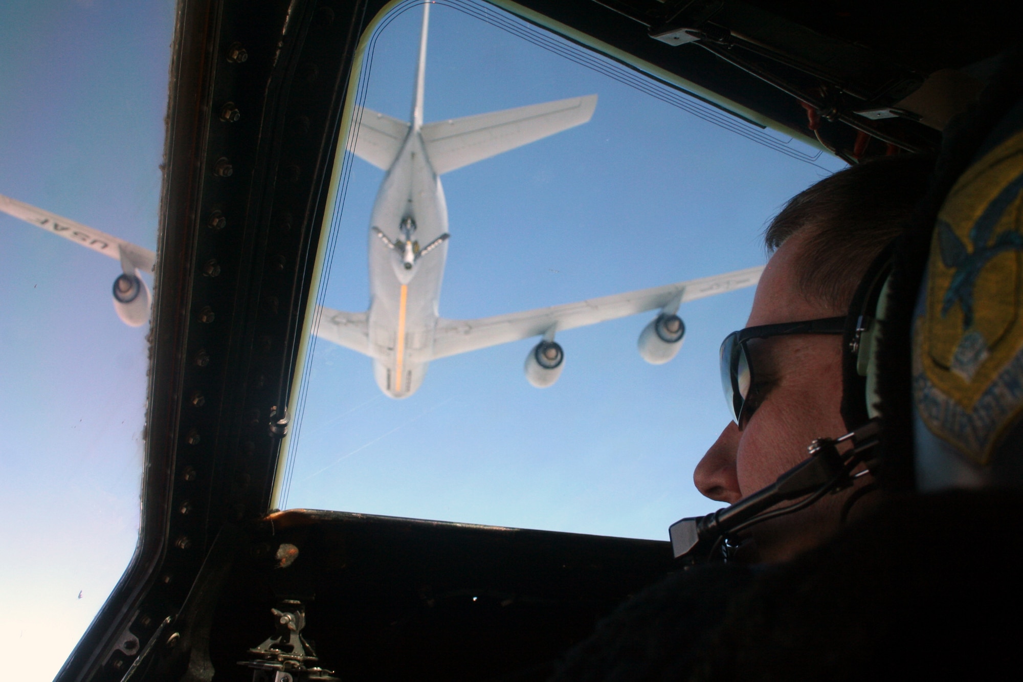 Lt. Col. Thomas Loper, C-5 pilot, flies a C-5M Super Galaxy on a mission on June 5, 2011, as the aircraft is about to be refueled by a KC-135R Stratotanker. The C-5M was was flying the Air Force's first direct delivery airlift mission through the Arctic Circle from Dover Air Force Base, Del., to Bagram Airfield, Afghanistan. Colonel Loper is the 436th Airlift Wing director of staff at Dover AFB.  (U.S. Air Force Photo/Master Sgt. Scott T. Sturkol)
