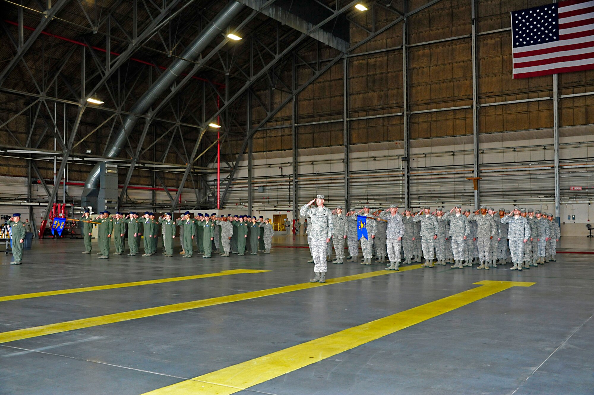 Members of the 62nd Airlift Wing render a salute to Col. R. Wyn Elder for the first time as the new 62nd Airlift Wing commander during the 62nd AW Change of Command Ceremony June 14 at Joint Base Lewis-McChord, Wash. (U.S. Air Force photo/Staff Sgt. Frances Kriss)