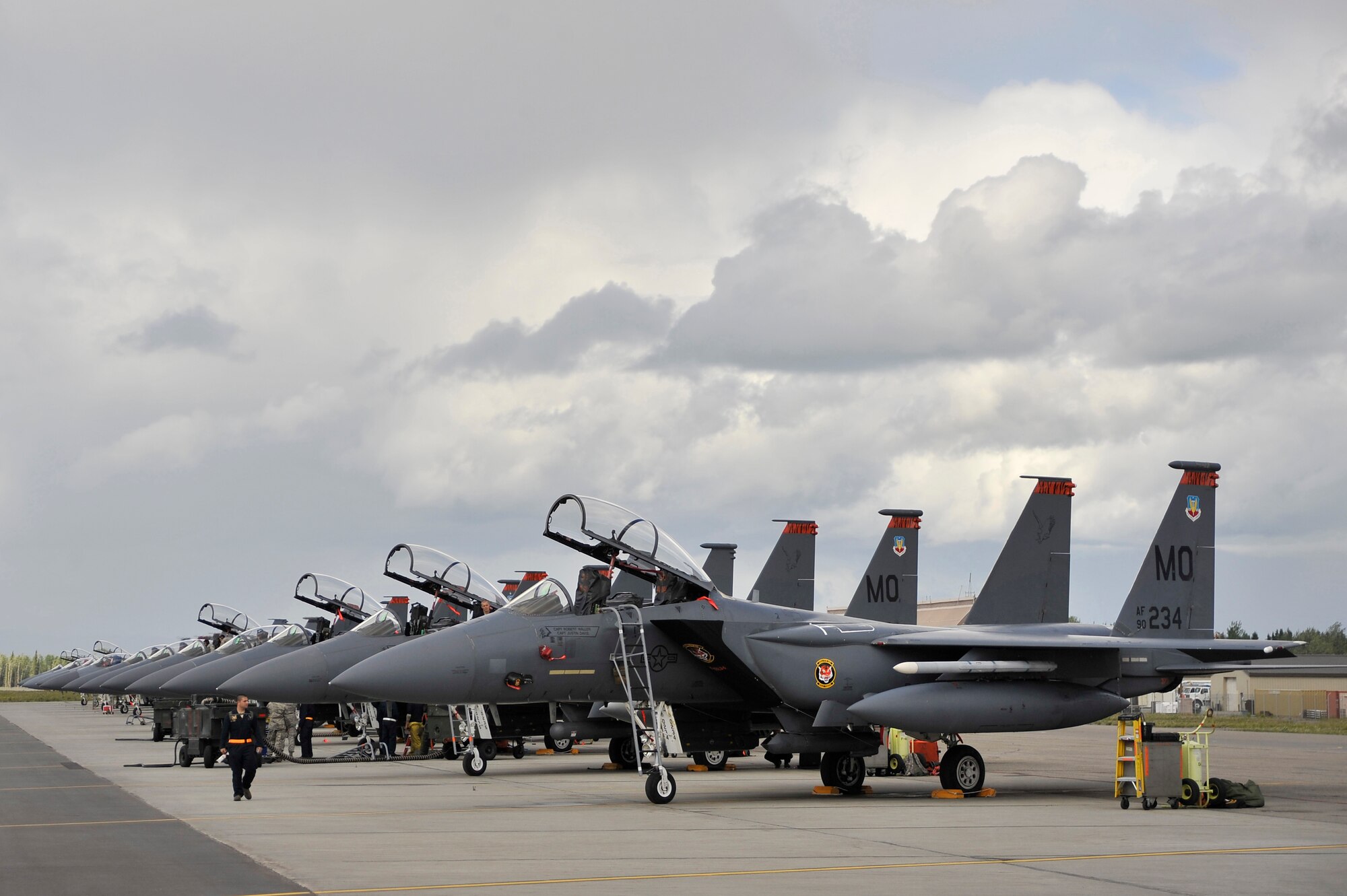 F-15E Strike Eagles await the next sortie during NORTHERN EDGE 2011 June 13, Eielson Air Force Base, Alaska. NORTHERN EDGE provides effective, flexible and capabilities-centered joint forces ready for deployment worldwide and enables real world proficiency in detection and tracking of units at sea, in the air and on land, in response to multiple crises. The Strike Eagles are assigned to the 391st Fighter Squadron, Mountain Home AFB, Idaho. (U.S. Air Force photo/Staff Sgt. Christopher Boitz)